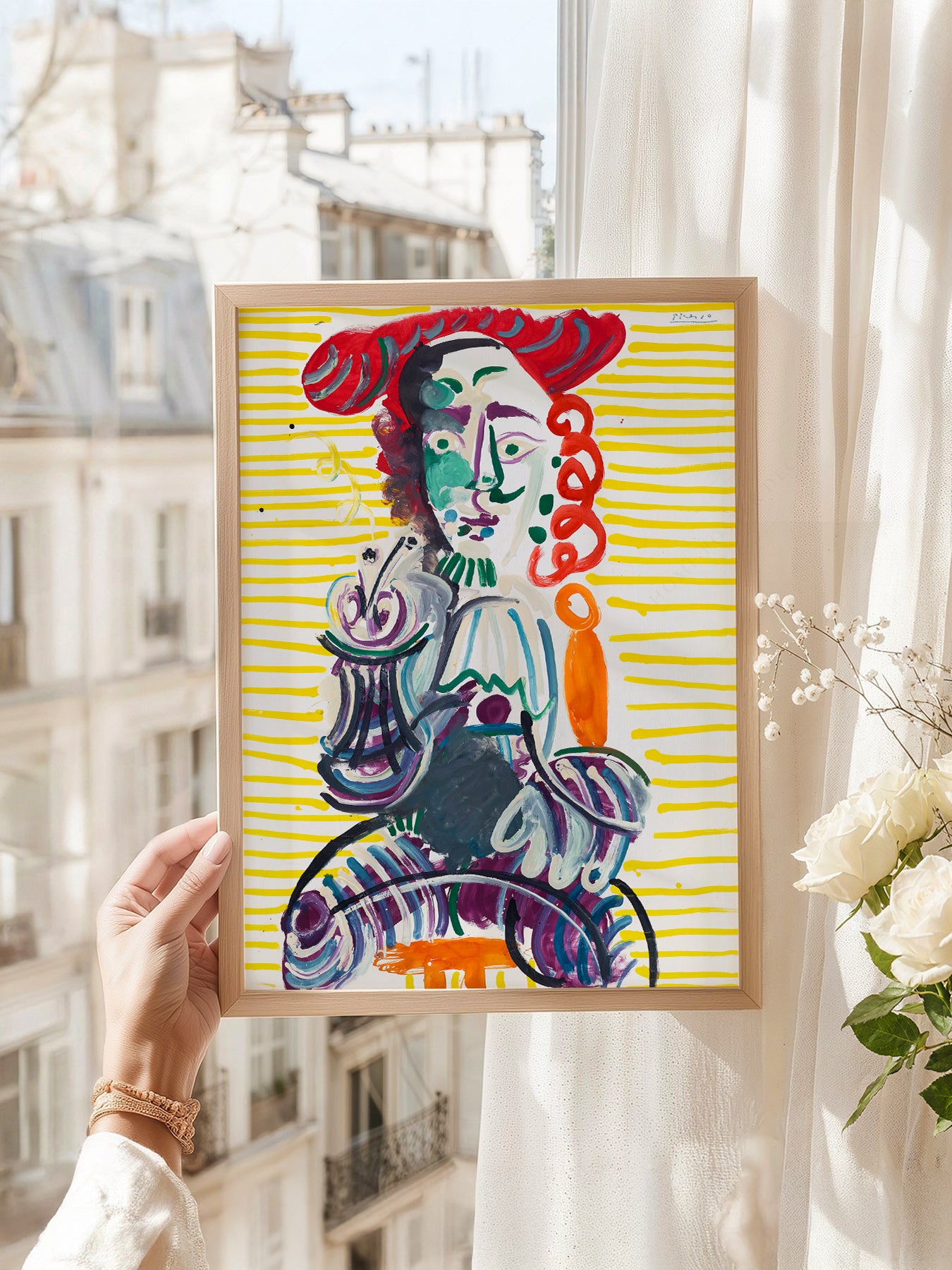 Pablo Picasso art print as wall decor in a minimalist home office