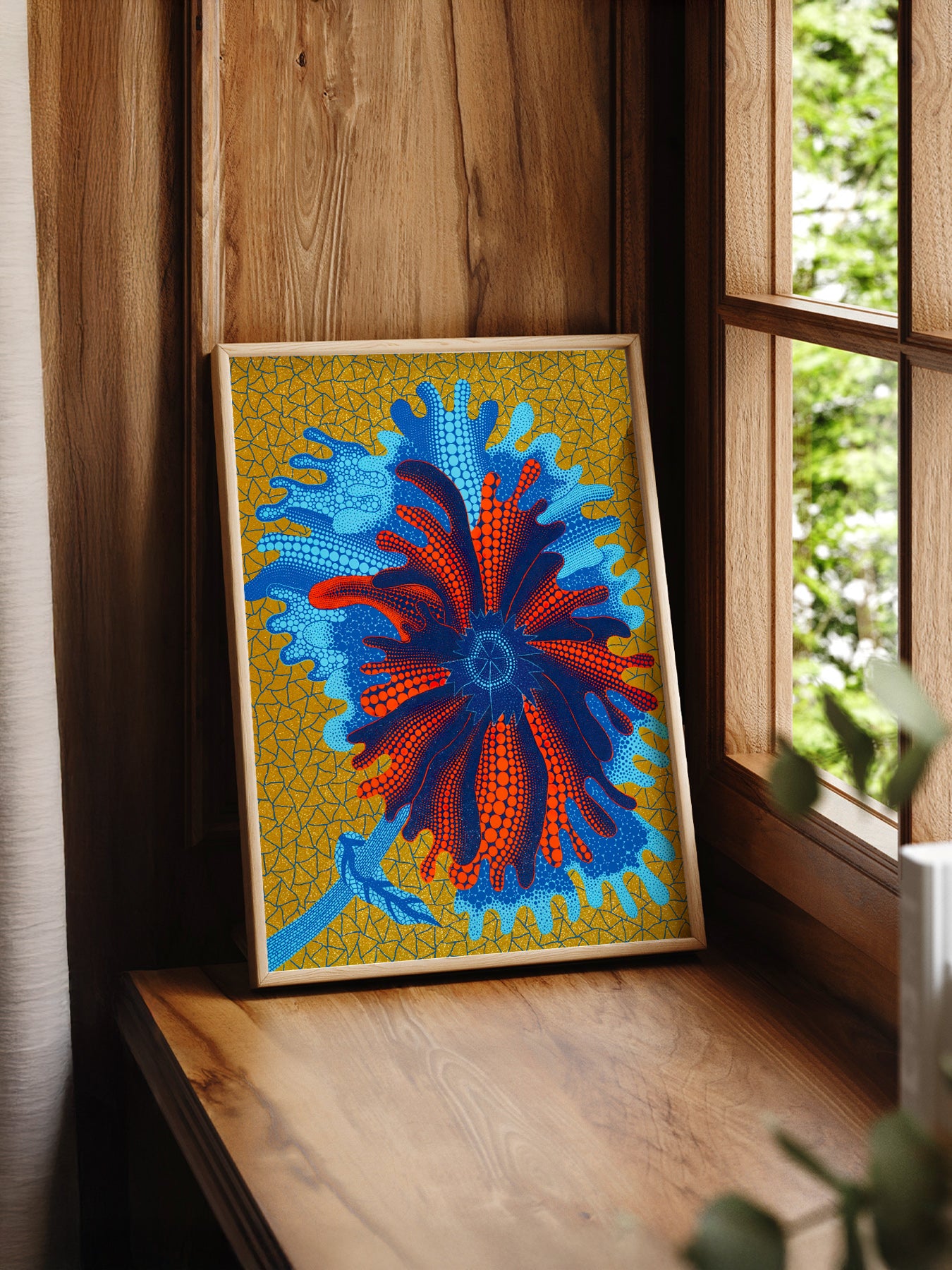 Yayoi Kusama Flower print styled in a mid-century modern dining room
