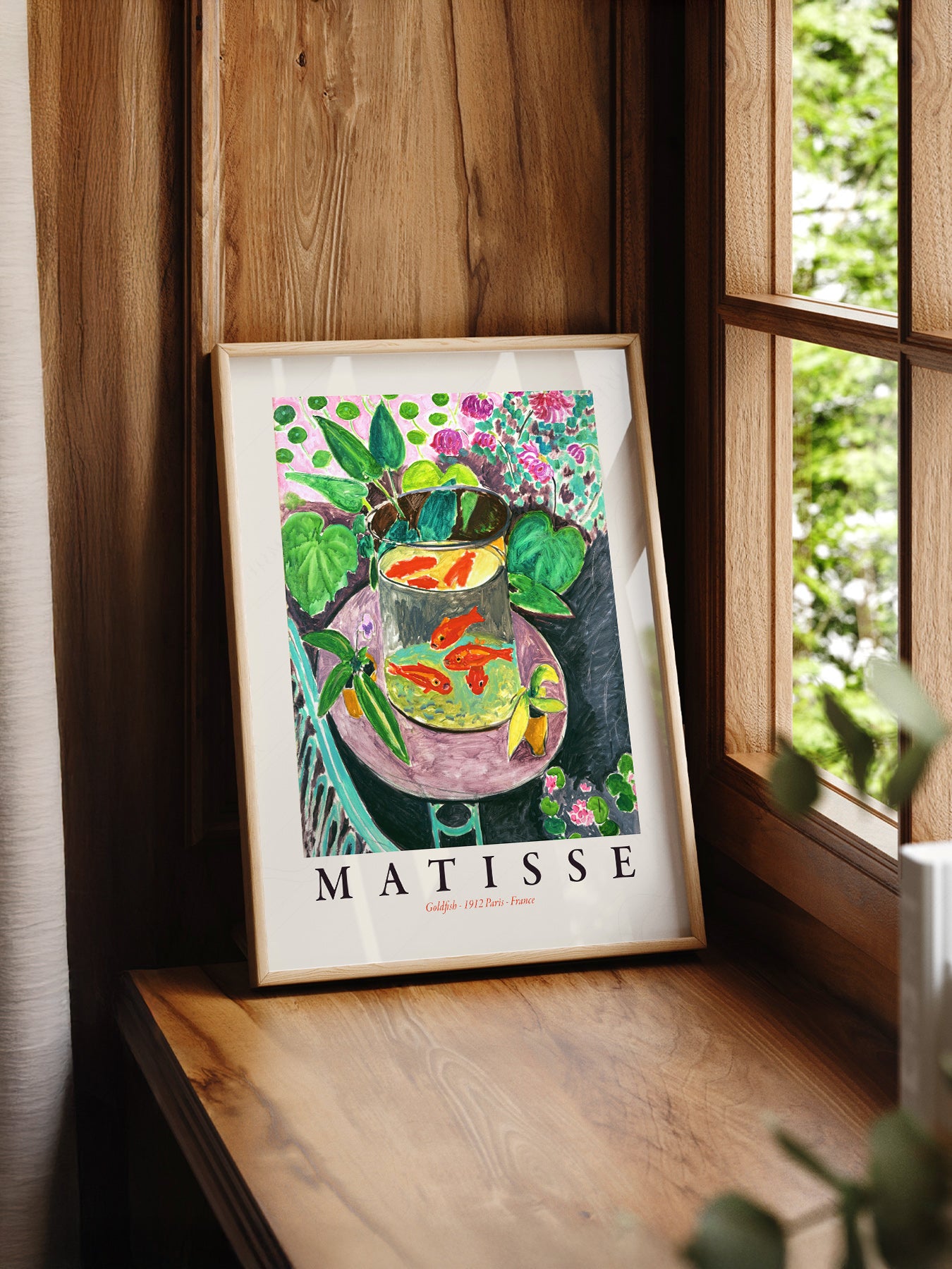 Henri Matisse Goldfish print styled in a mid-century modern dining room