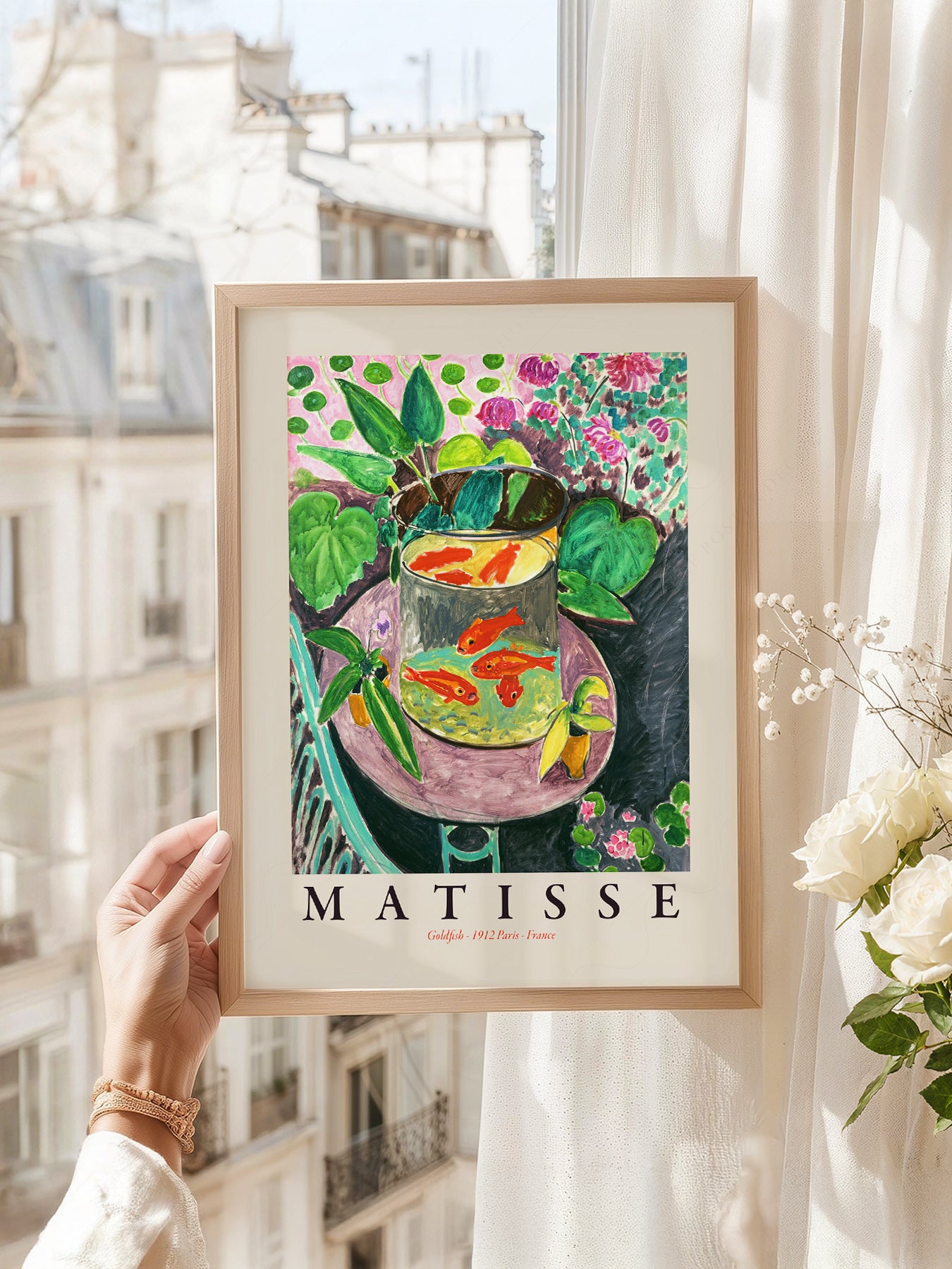 Henri Matisse art print as wall decor in a minimalist home office