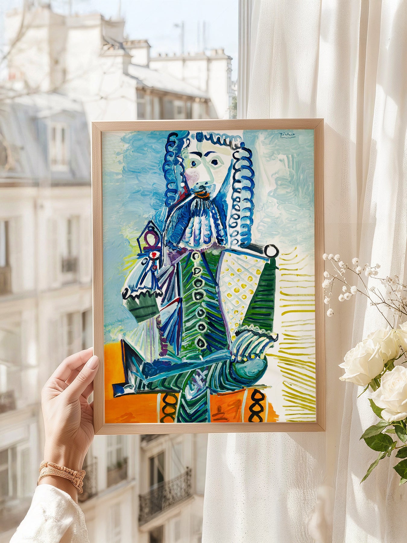 Pablo Picasso art print as wall decor in a minimalist home office