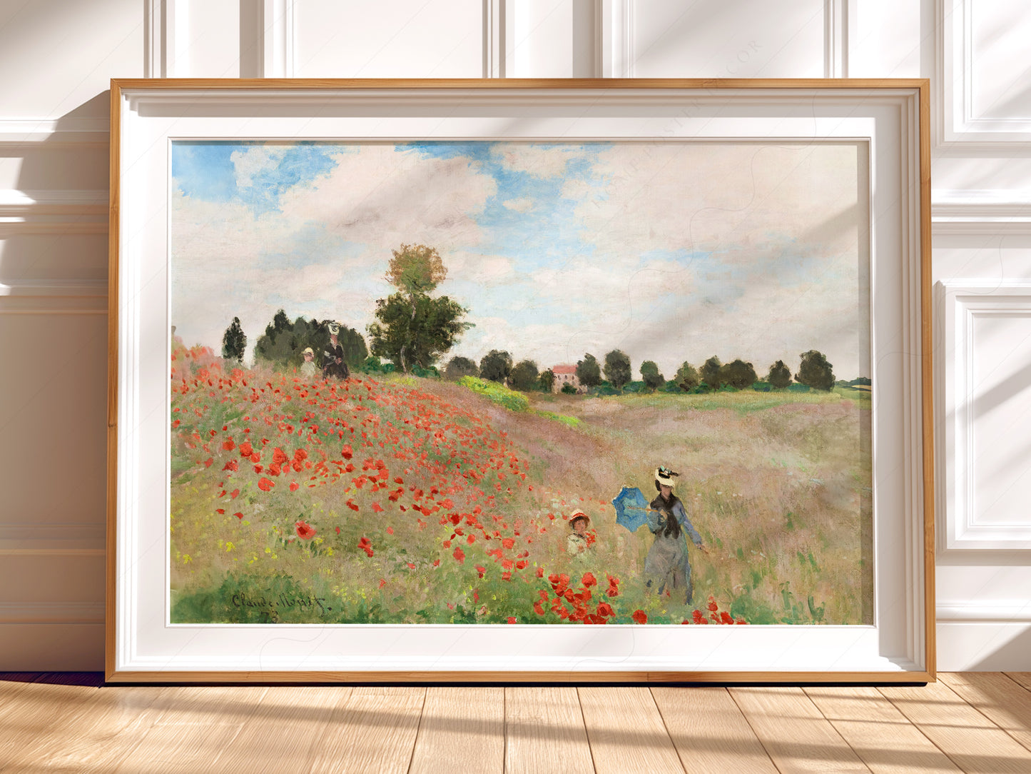 Claude Monet wall art in a cozy home study or reading room