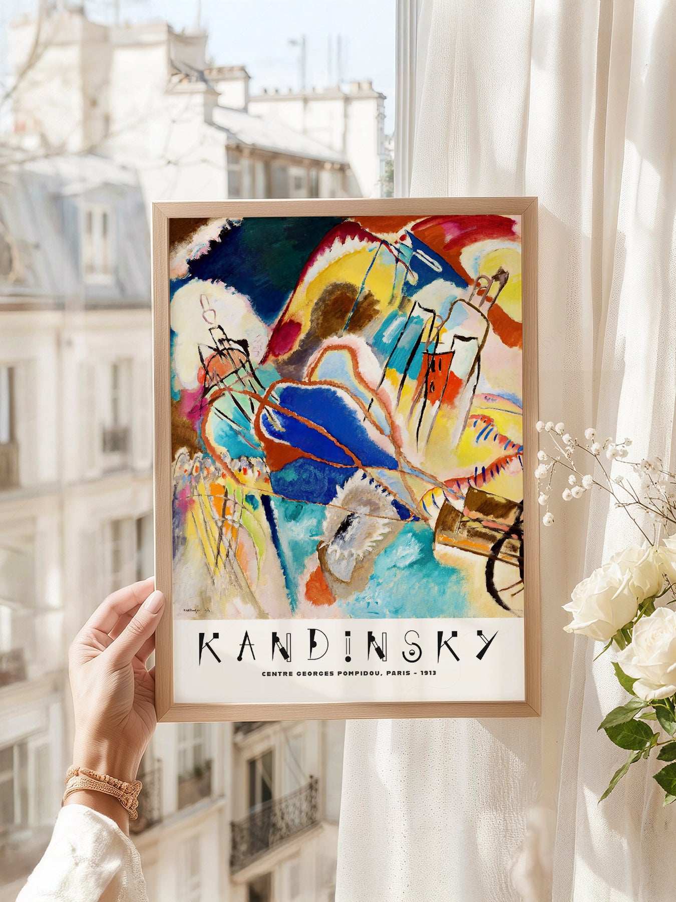 Wassily Kandinsky art print as wall decor in a minimalist home office