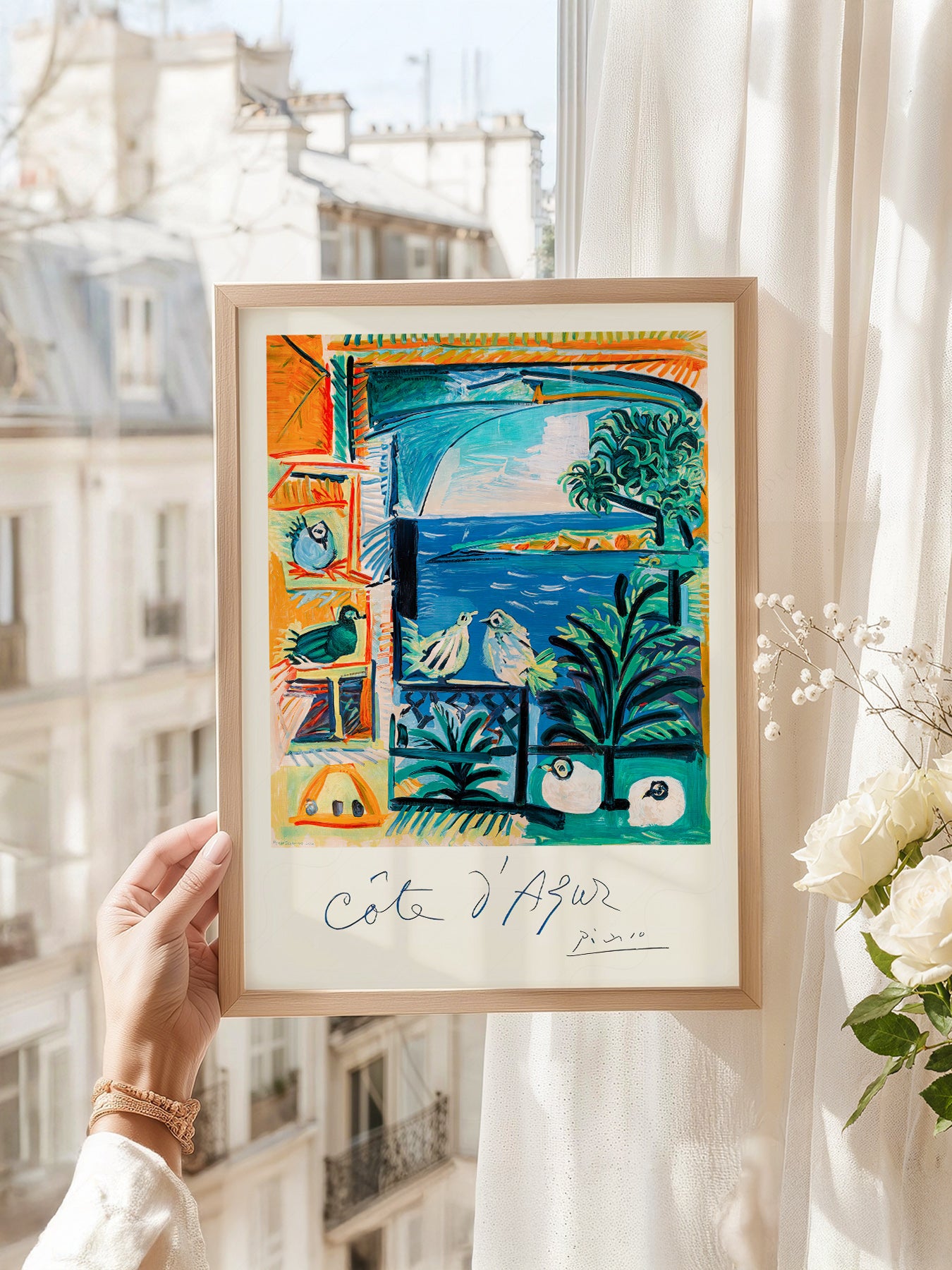 Pablo Picasso art print as wall decor in a minimalist home office