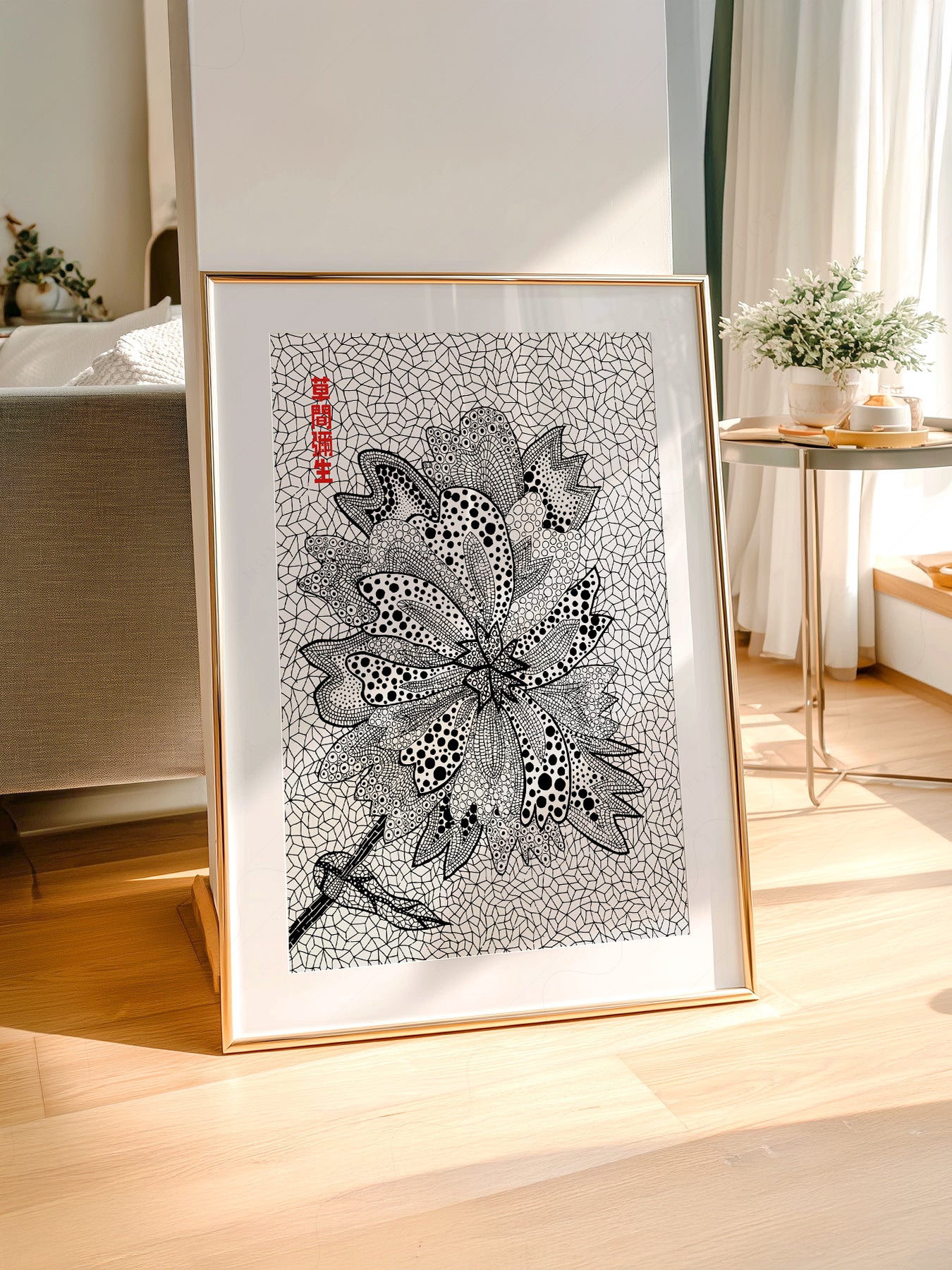 Yayoi Kusama art print styled in a Scandinavian bedroom
