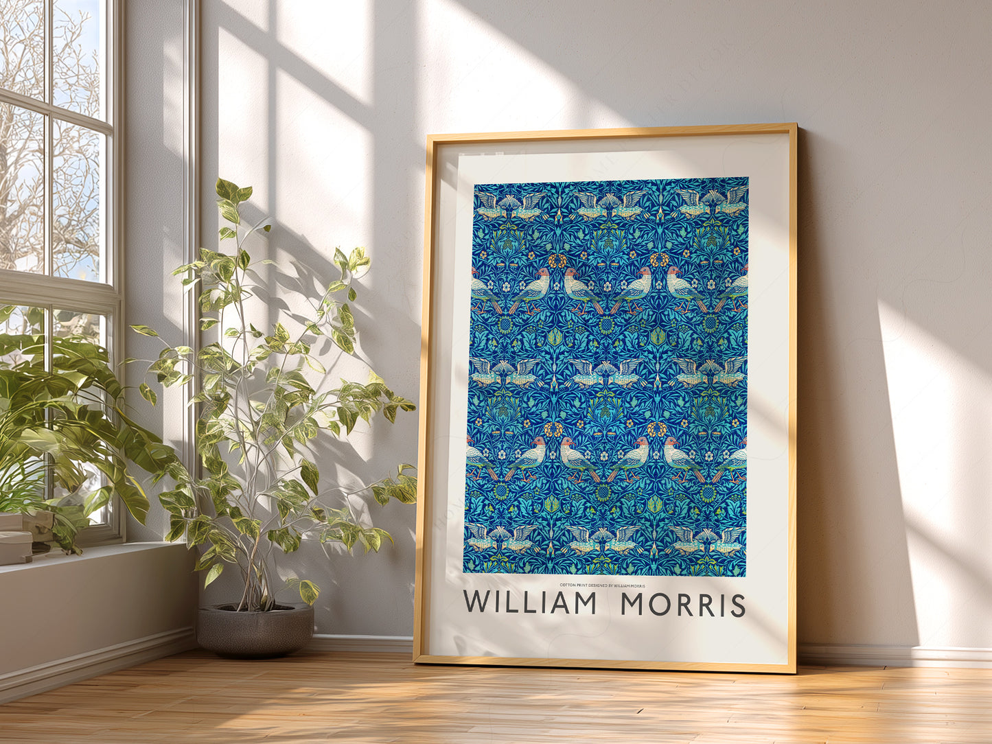 William Morris art print as wall decor in a minimalist home office