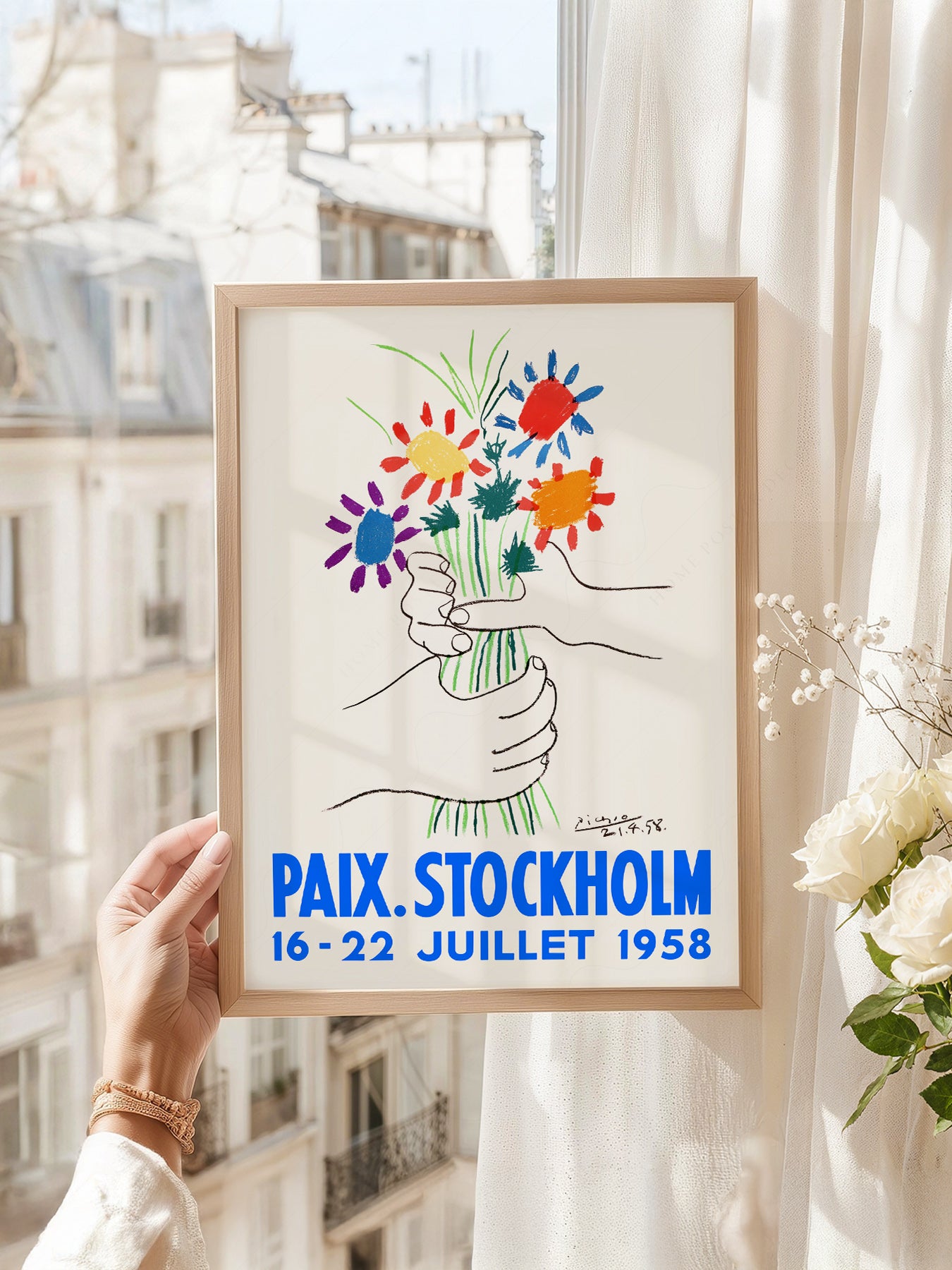 Pablo Picasso art print as wall decor in a minimalist home office