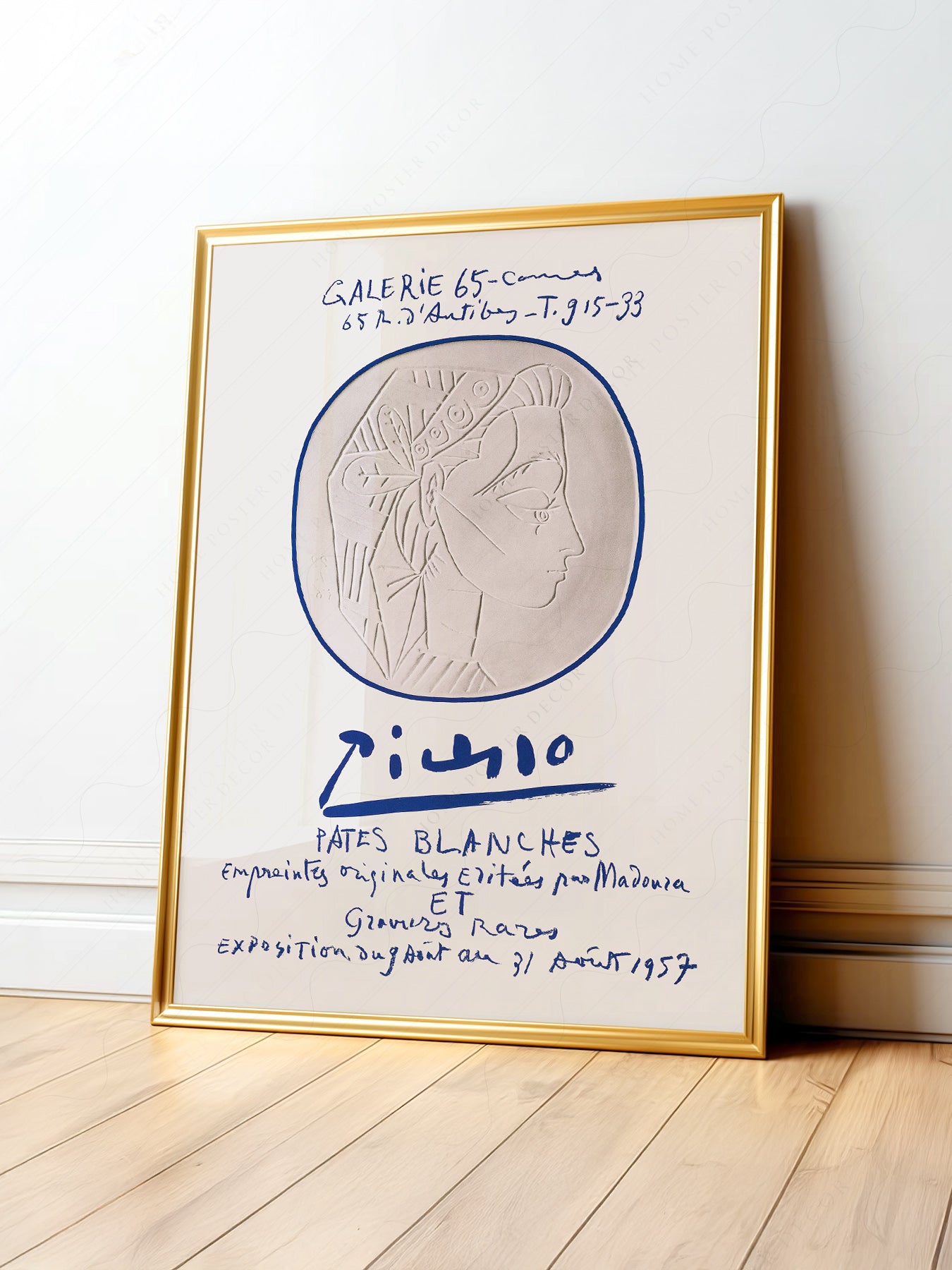 Pablo Picasso Galerie 65 Pâtes Blanches exhibition poster featuring embossed portrait relief with blue circle and signature.