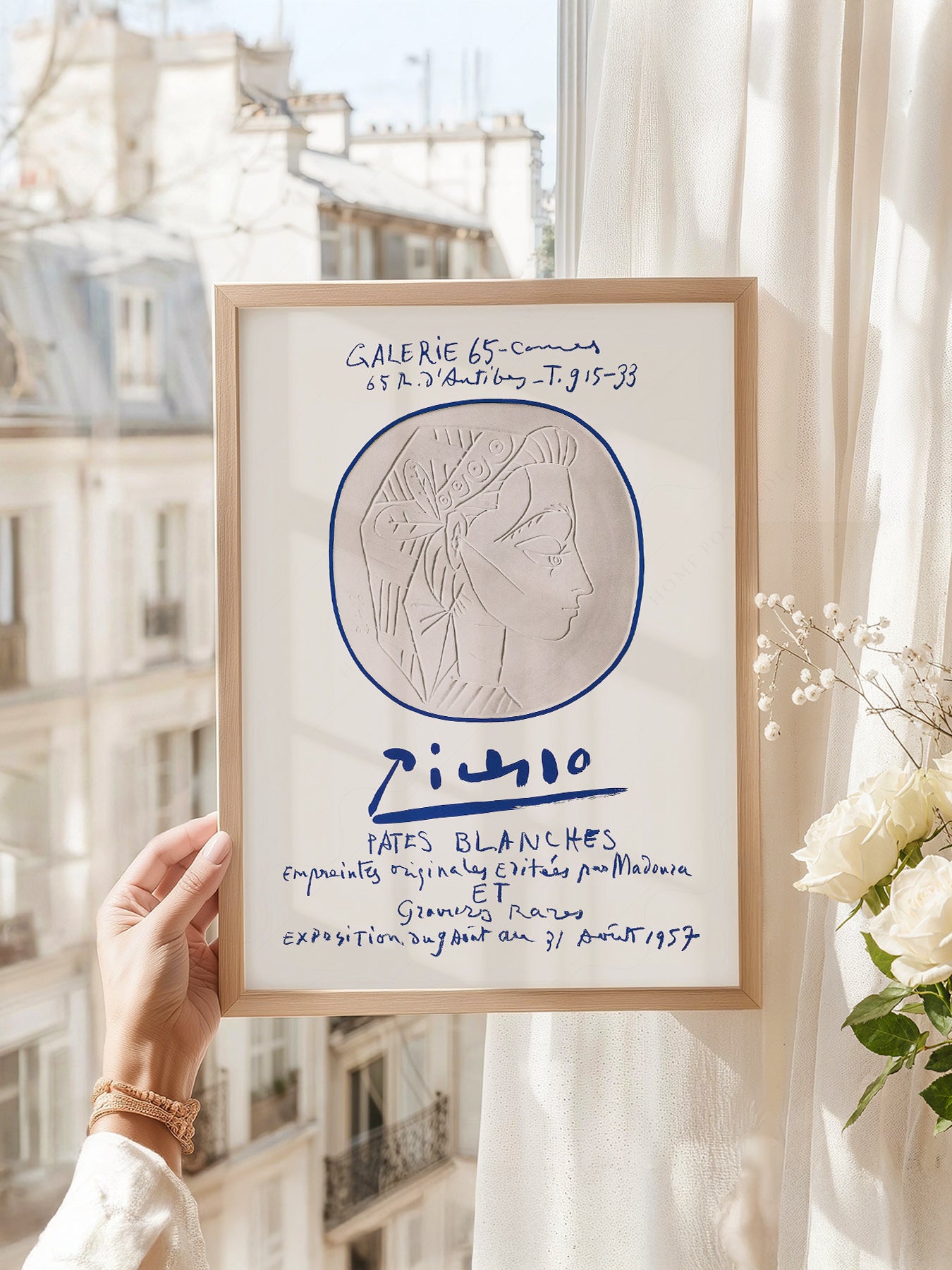 Pablo Picasso art print as wall decor in a minimalist home office