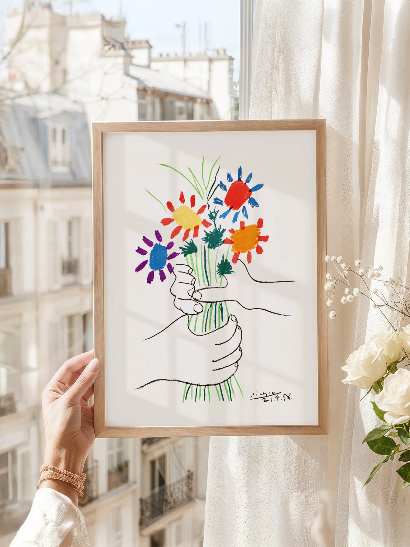 Pablo Picasso art print as wall decor in a minimalist home office
