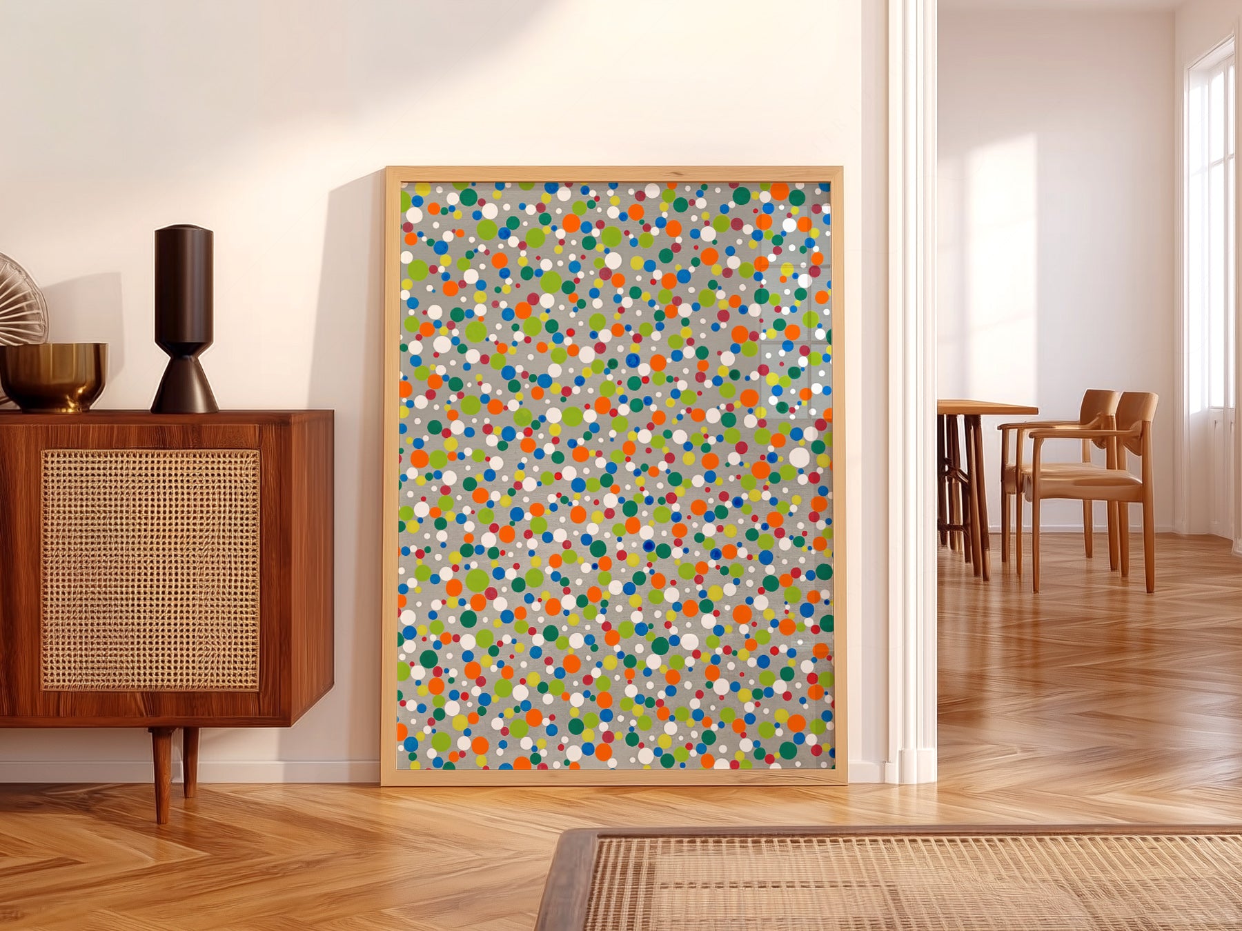 Yayoi Kusama Dots art print displayed in a soft pastel nursery setting
