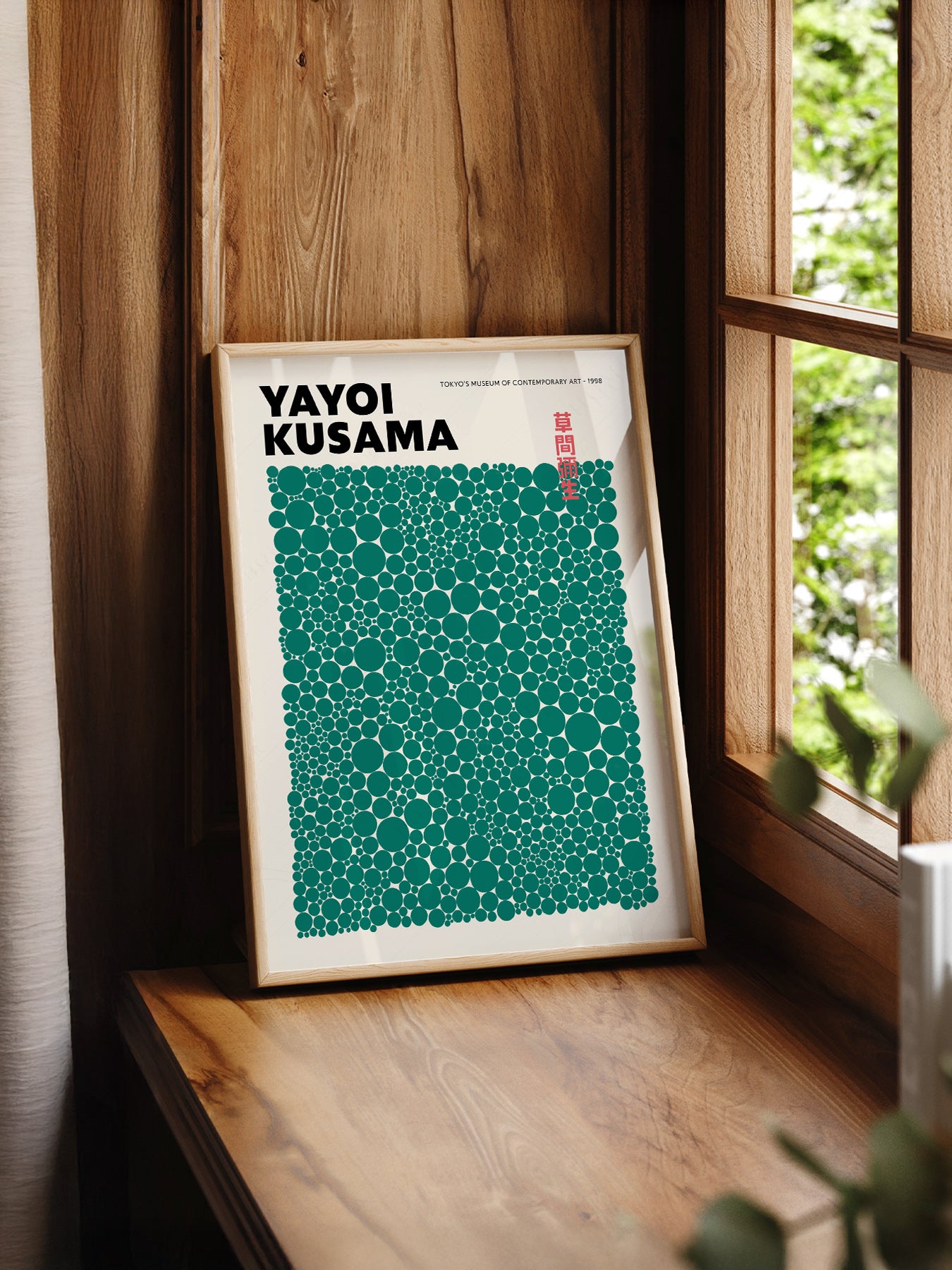 Yayoi Kusama Green Dots Exhibition print styled in a mid-century modern dining room