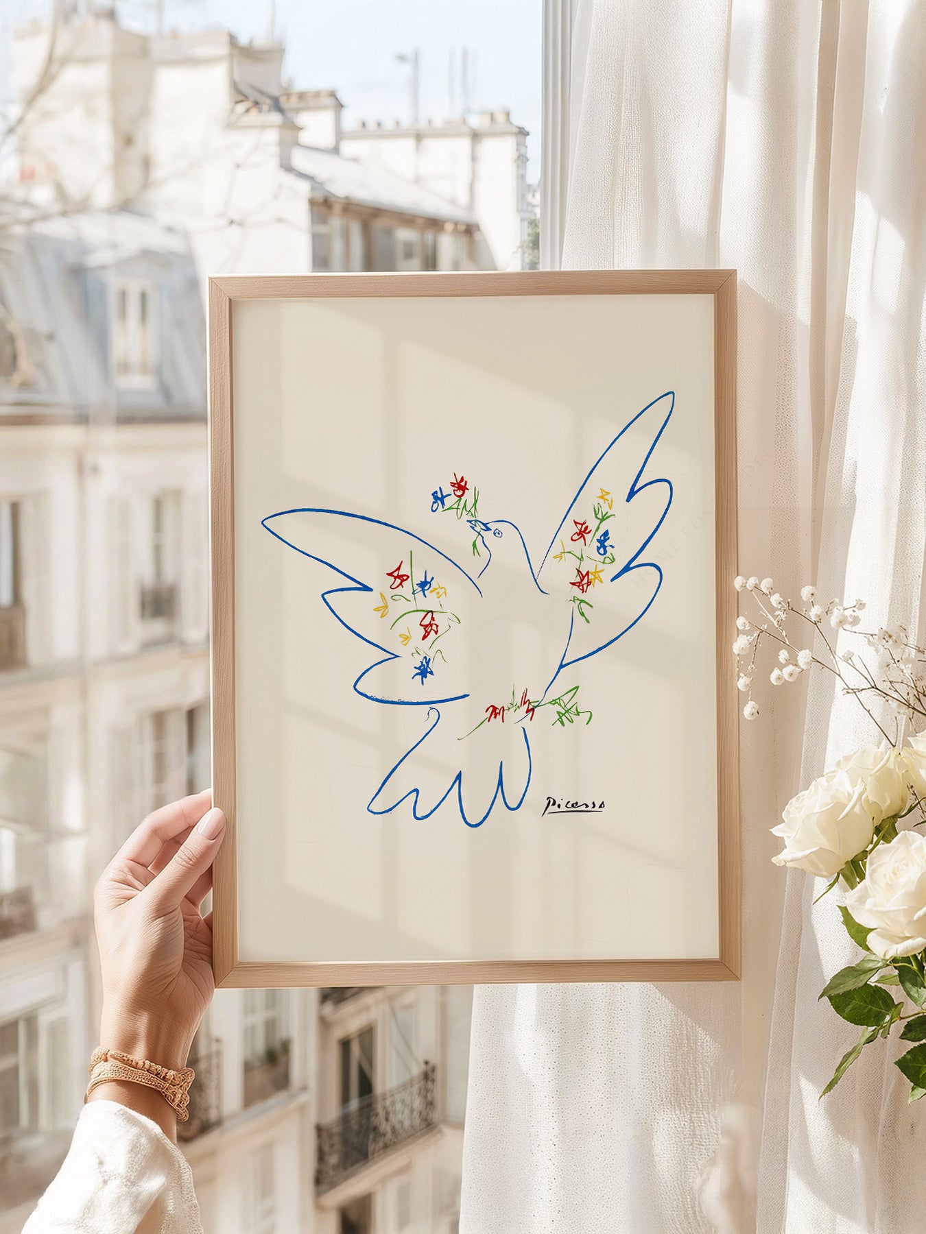 Pablo Picasso art print as wall decor in a minimalist home office