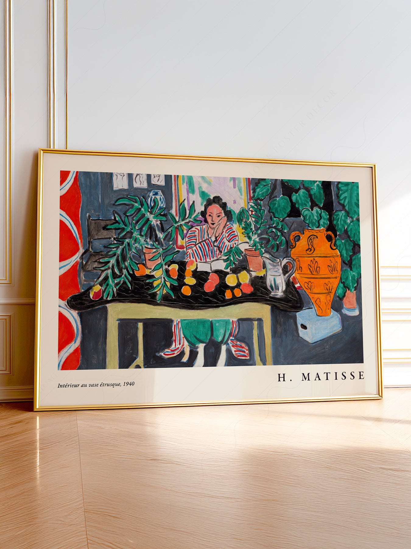 Henri Matisse Interior with Etruscan Vase art print featuring a woman surrounded by lush plants and colorful still life.