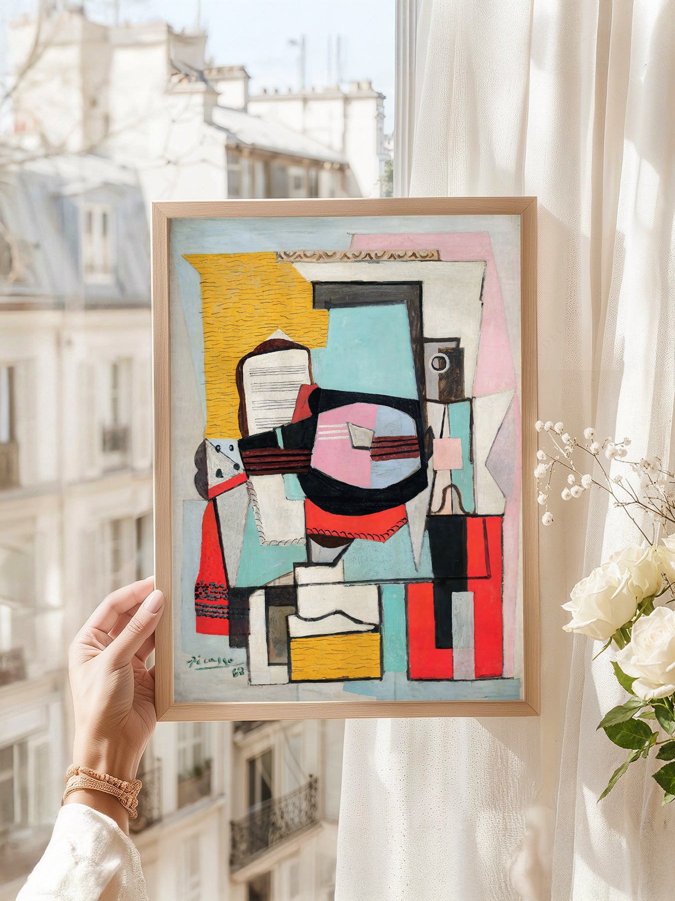 Pablo Picasso art print as wall decor in a minimalist home office