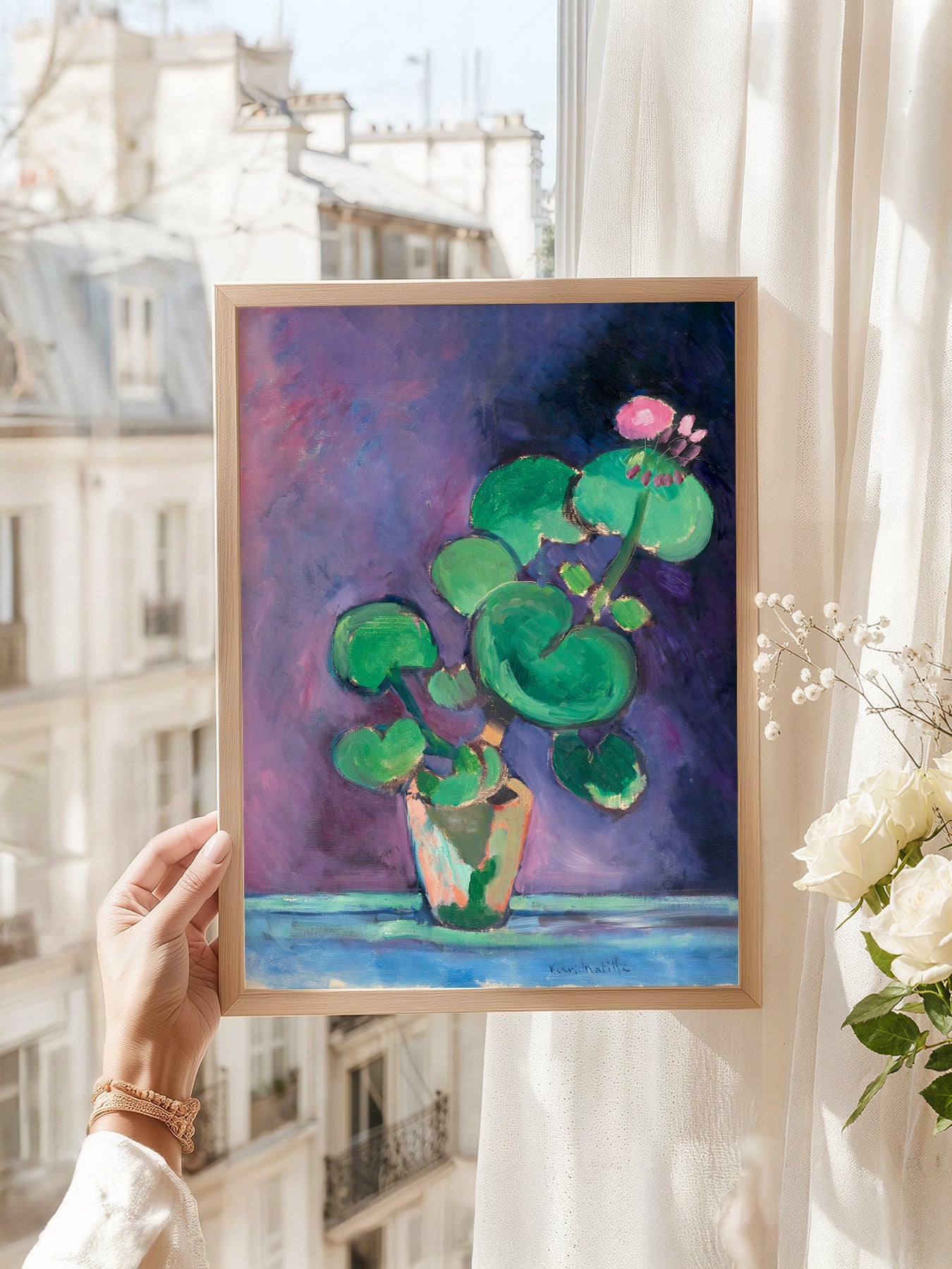 Henri Matisse art print as wall decor in a minimalist home office