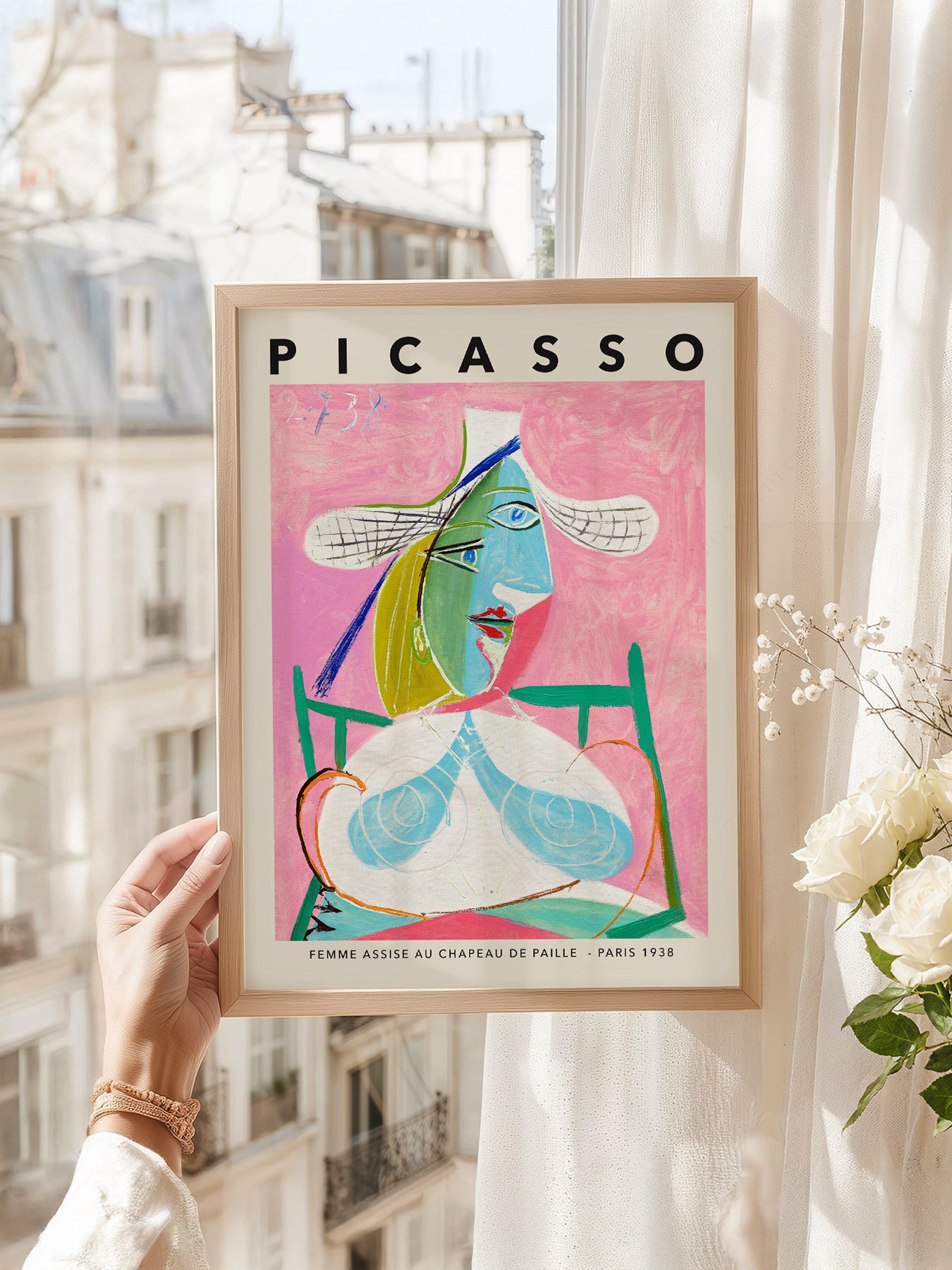 Pablo Picasso art print as wall decor in a minimalist home office