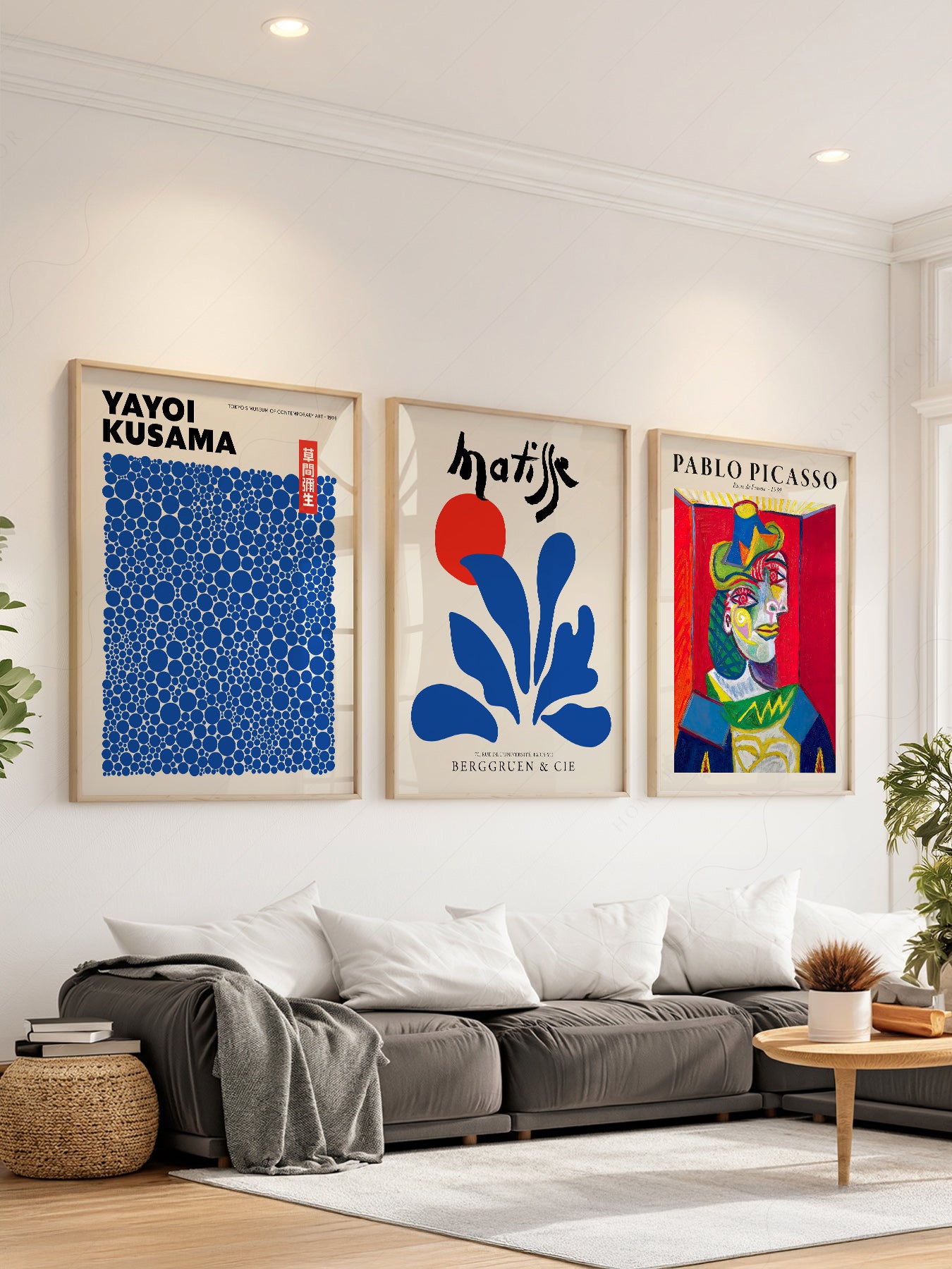 Gallery wall set featuring Yayoi Kusama, Henri Matisse, and Pablo Picasso museum art prints in a modern living room