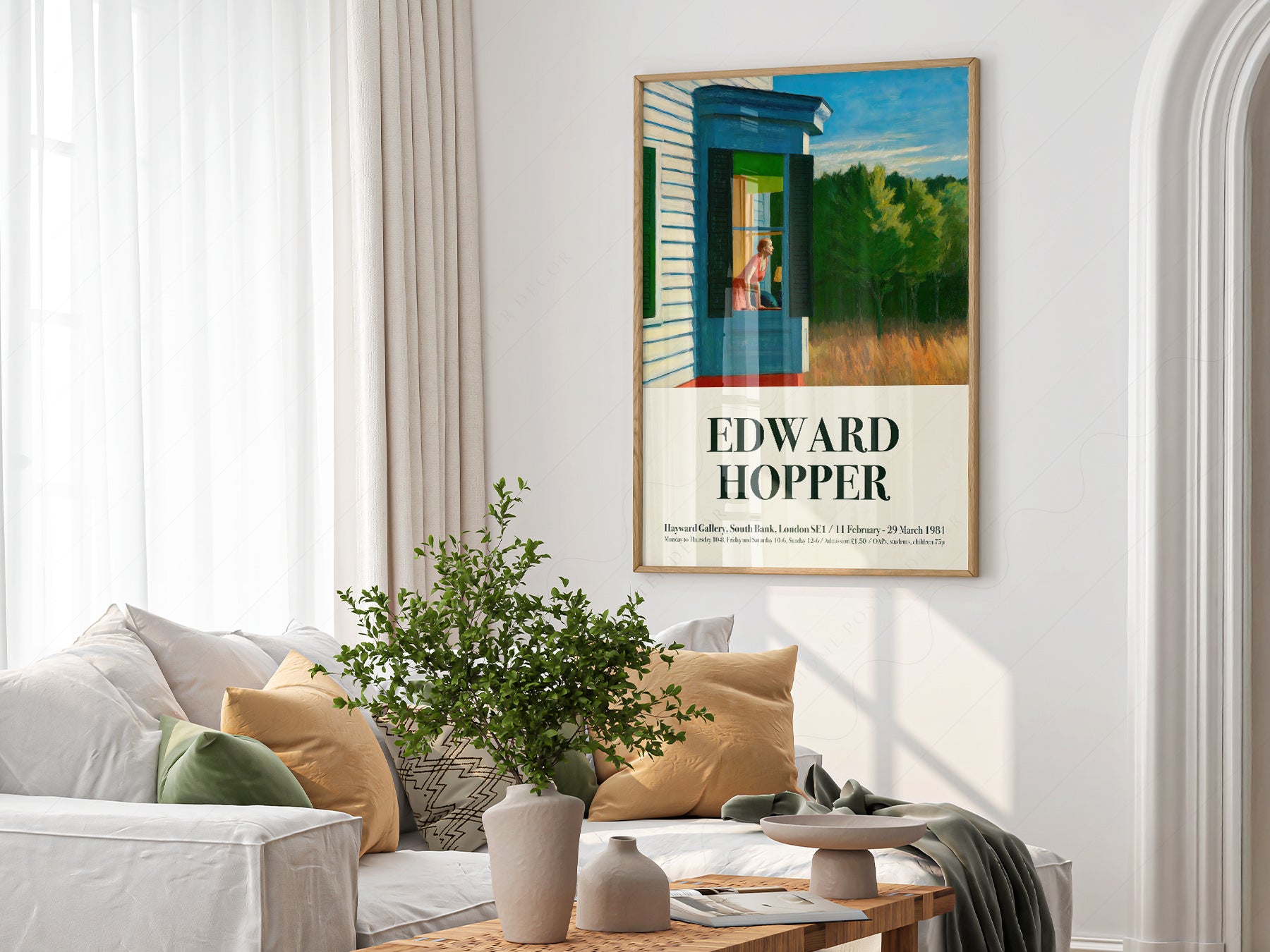 Edward Hopper art print as wall decor in a minimalist home office