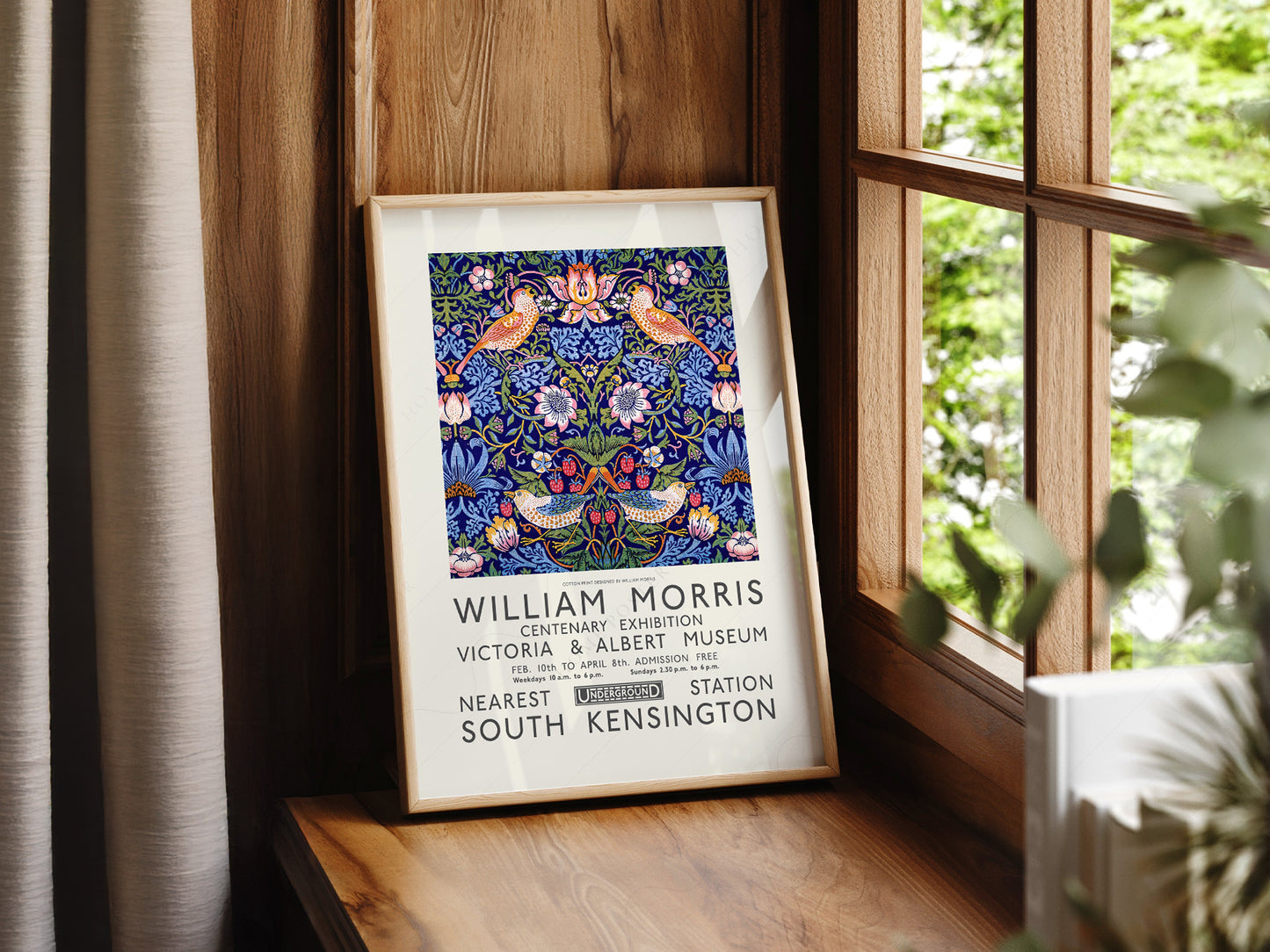 William Morris Strawberry Thief print styled in a mid-century modern dining room