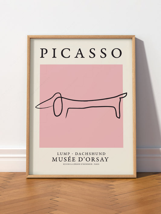 Pablo Picasso Lump Dachshund Line wall art print displayed in a bright modern living room