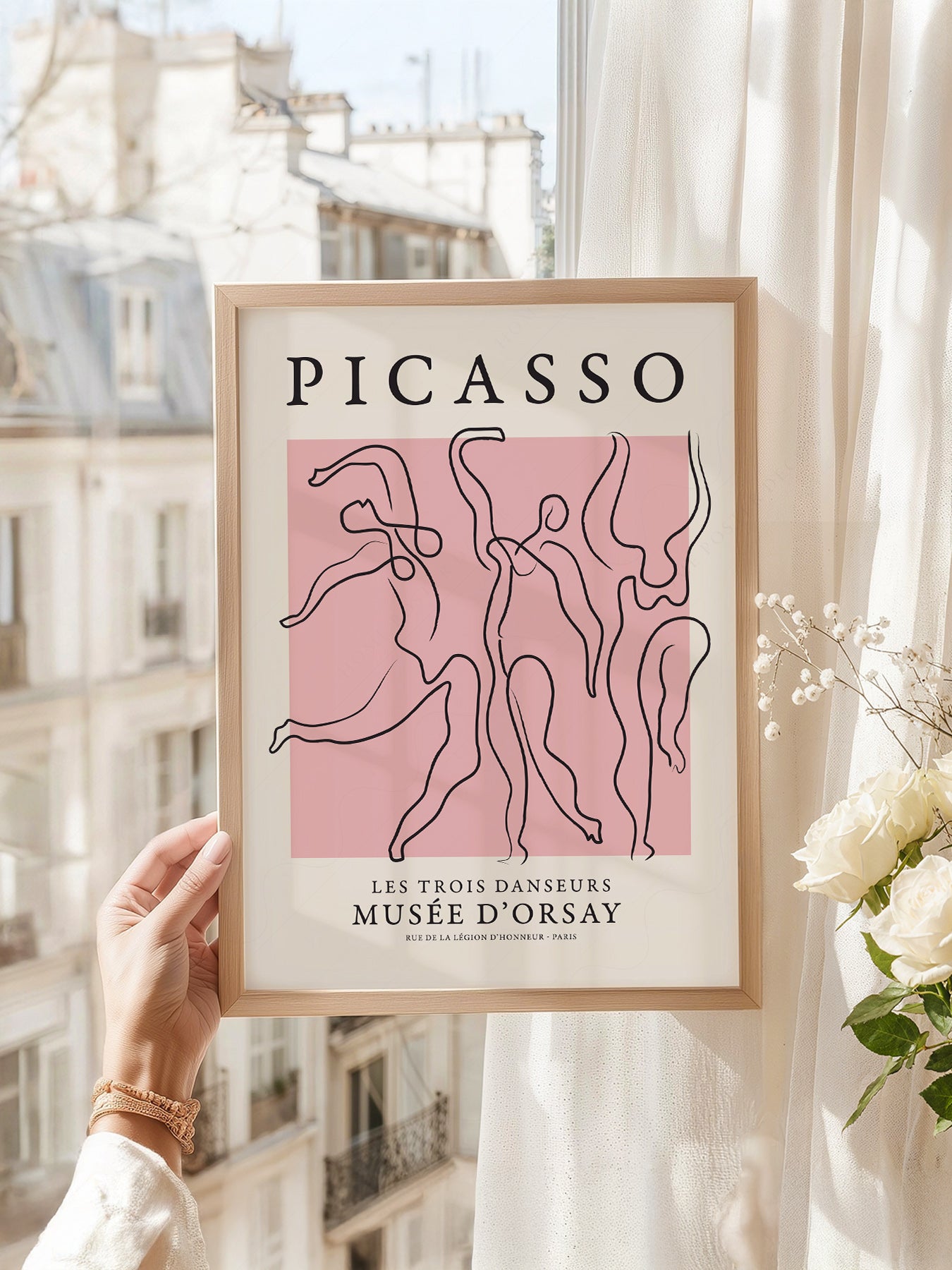 Pablo Picasso art print as wall decor in a minimalist home office