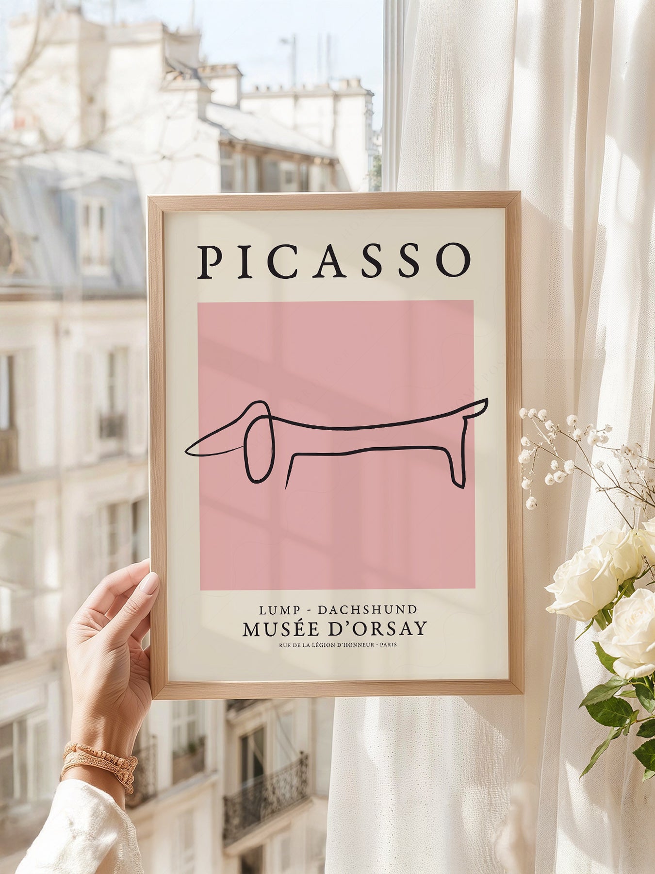 Pablo Picasso art print as wall decor in a minimalist home office