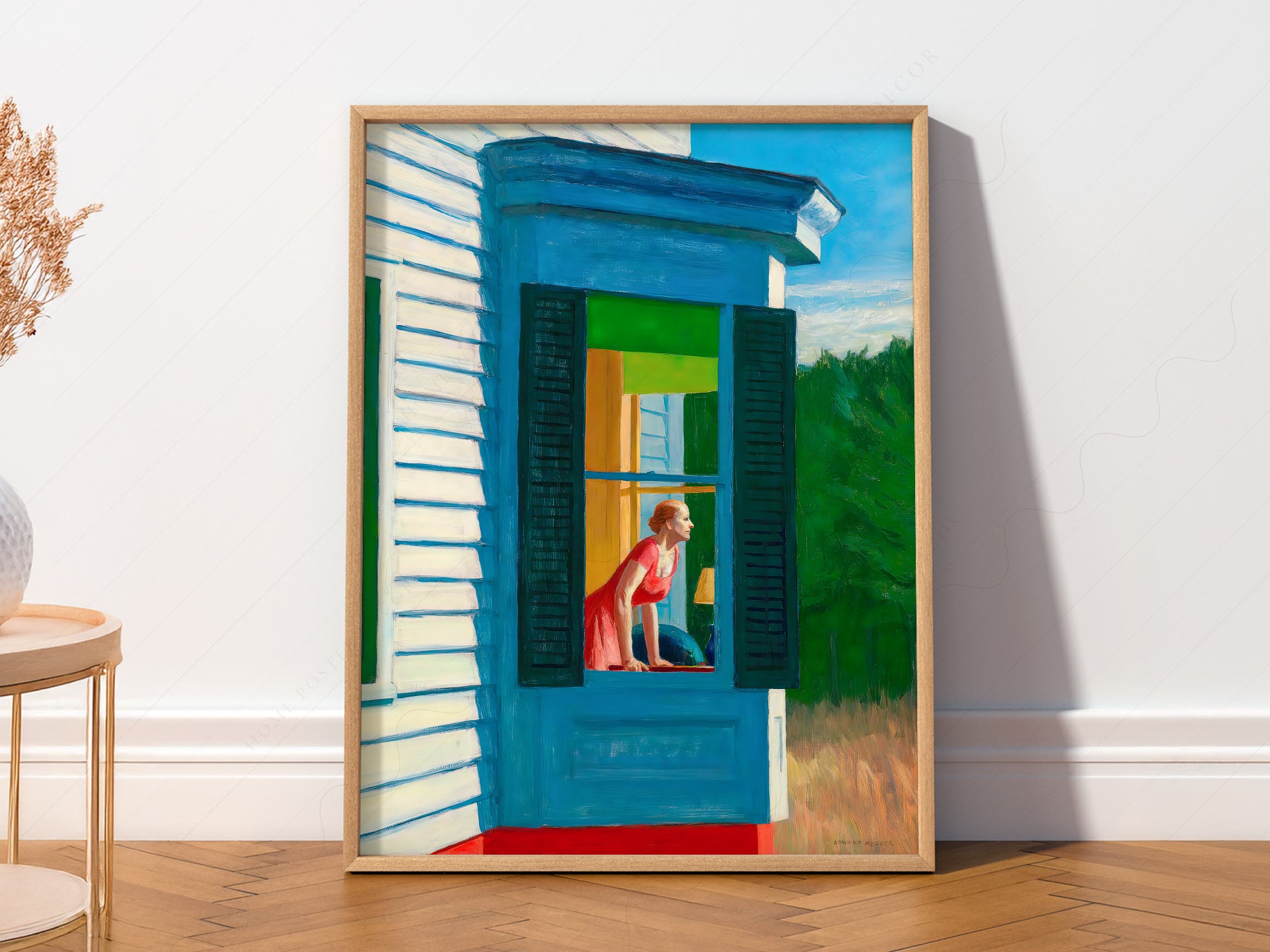 Edward Hopper art print as wall decor in a minimalist home office
