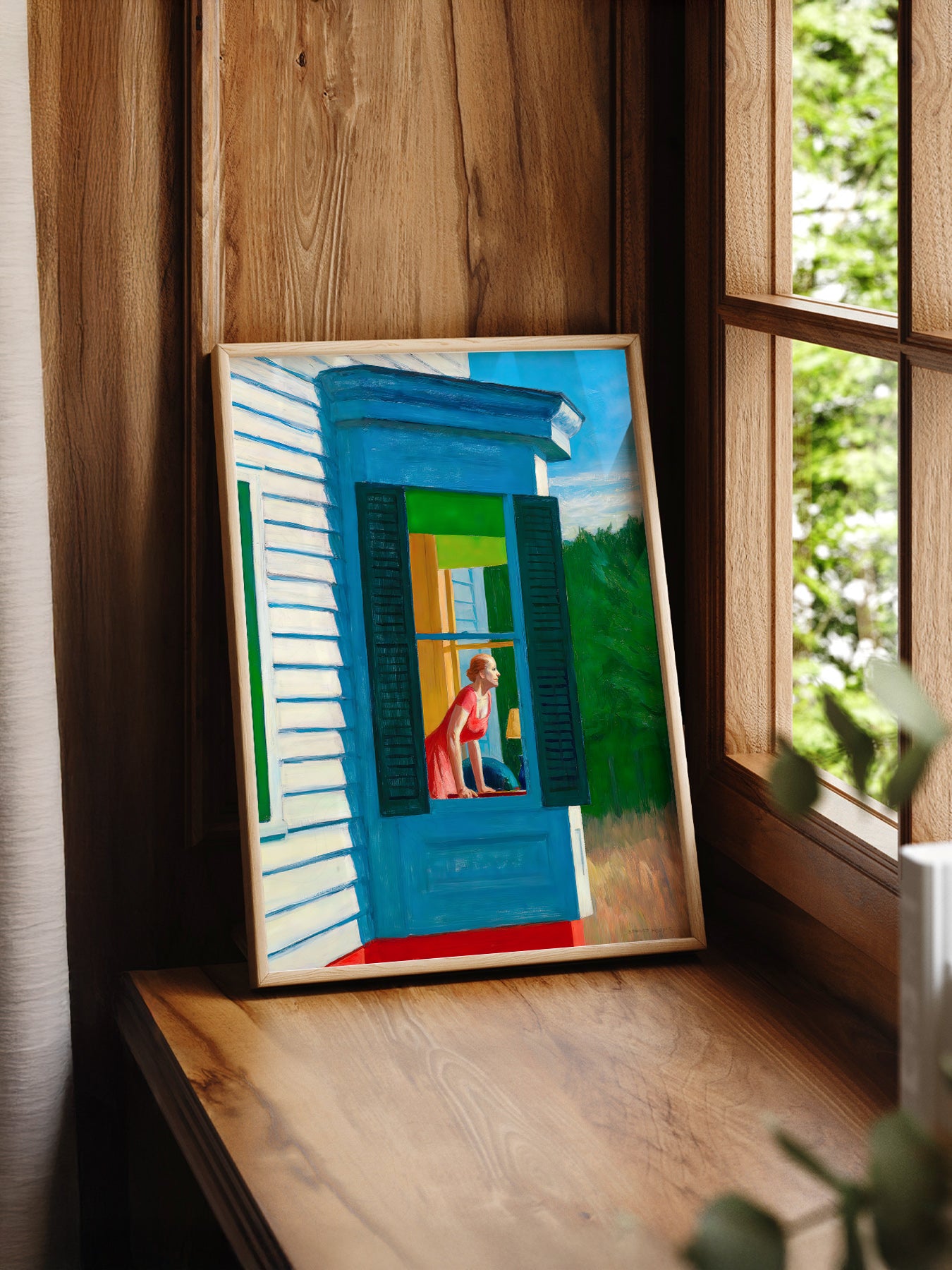 Edward Hopper Cape Cod Morning print styled in a mid-century modern dining room