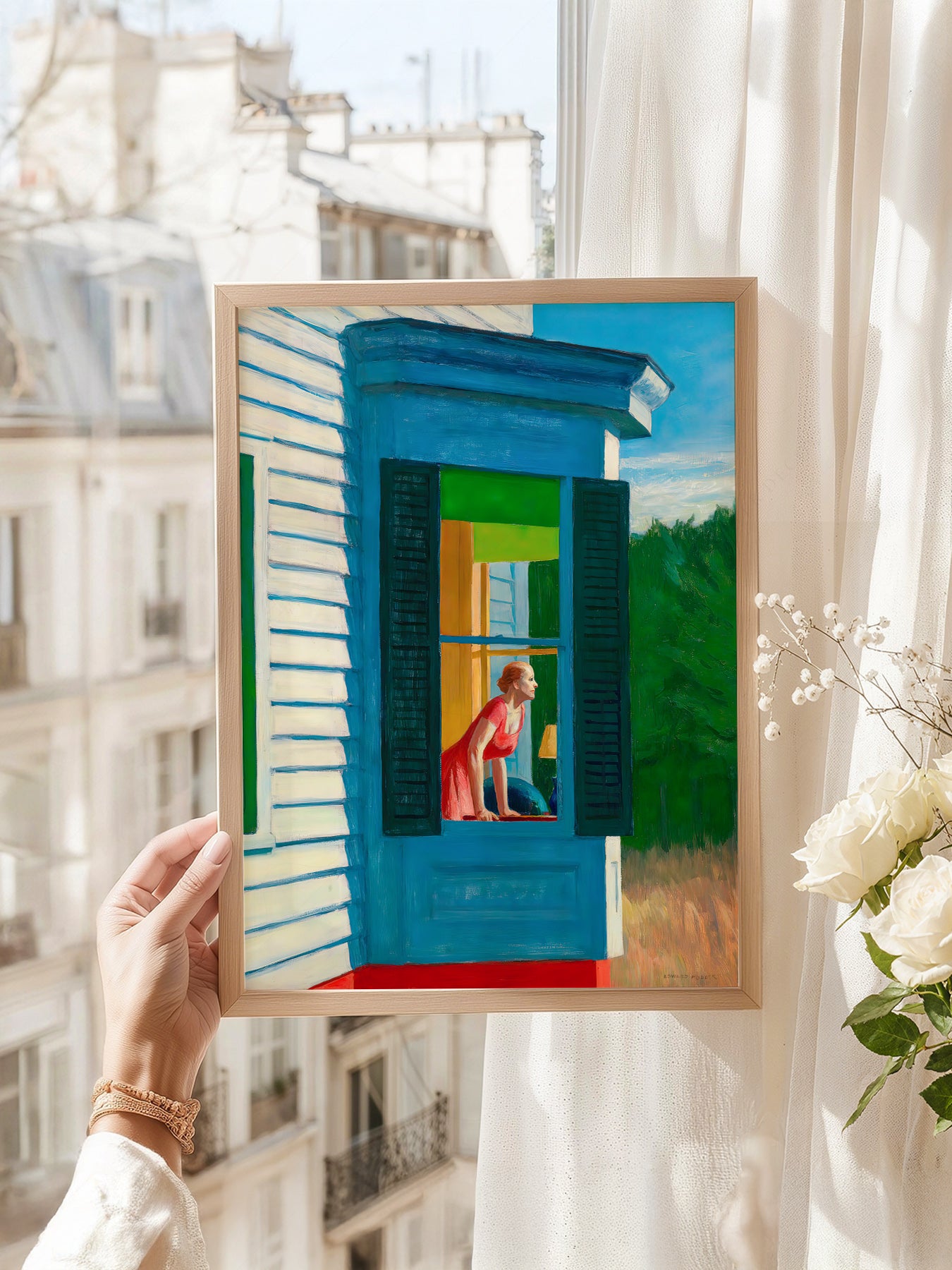 Edward Hopper art print as wall decor in a minimalist home office