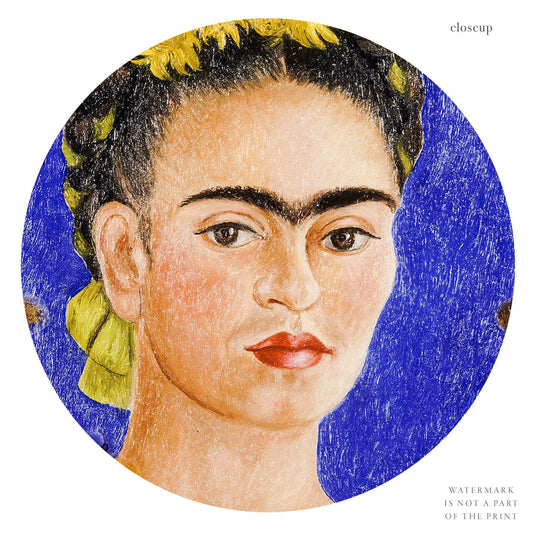 Frida Kahlo art print as wall decor in a minimalist home office