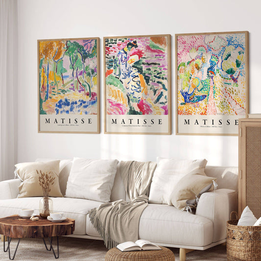 Henri Matisse gallery wall set of three Fauvist landscape art prints featuring vibrant Collioure scenes displayed above a modern sofa.