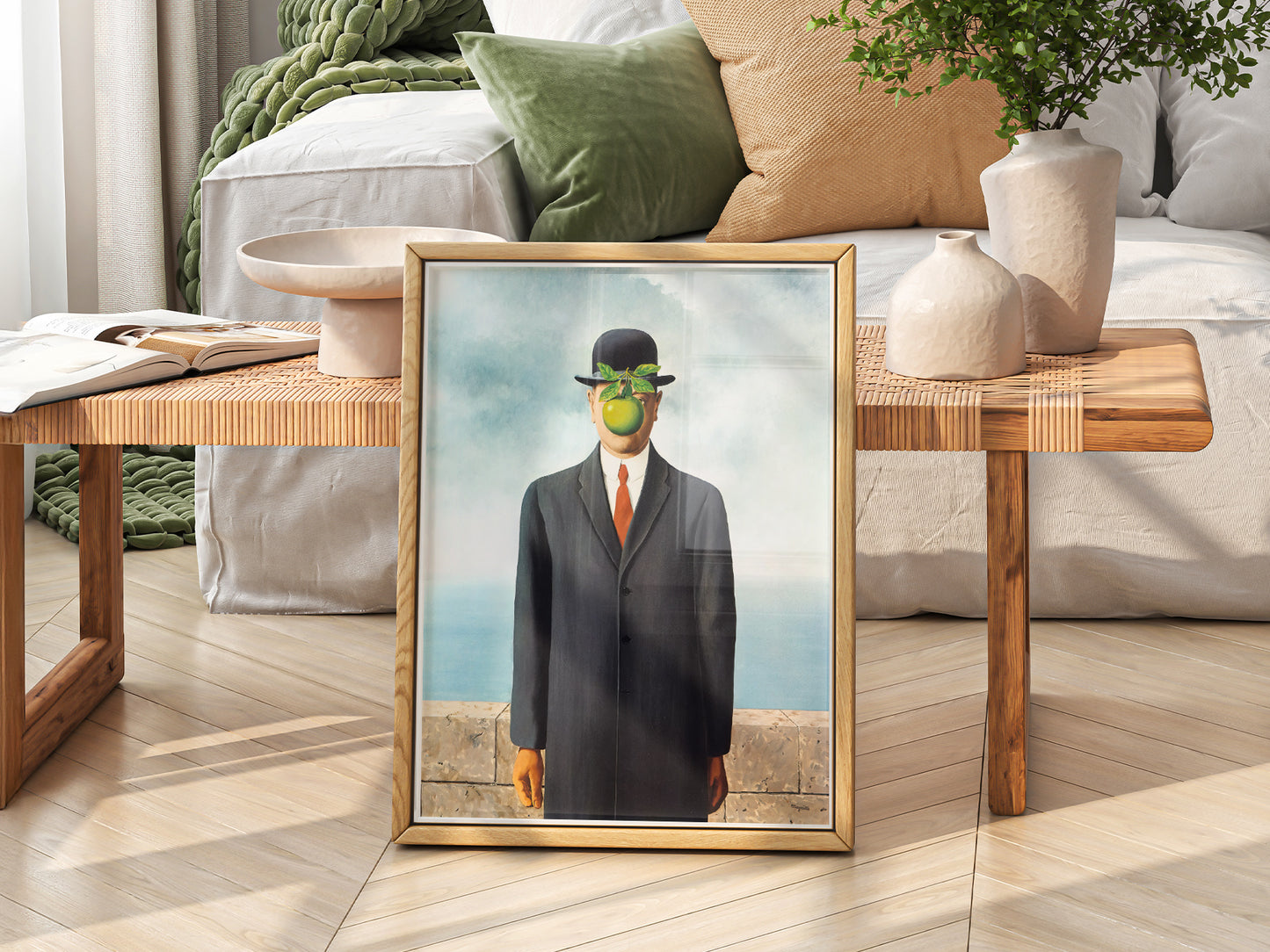 René Magritte The Son of Man print styled in a mid-century modern dining room