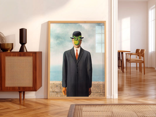 René Magritte The Son of Man wall art print displayed in a bright modern living room