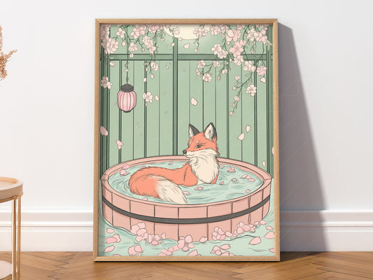 A vertical art print featuring a red fox with a white-tipped tail sitting in a circular wooden bath tub filled with water and pink petals. The background is a pale green fence with pink cherry blossoms hanging from the top and a pink lantern to the left. The scene is calm and illustrative with soft pastel colors.