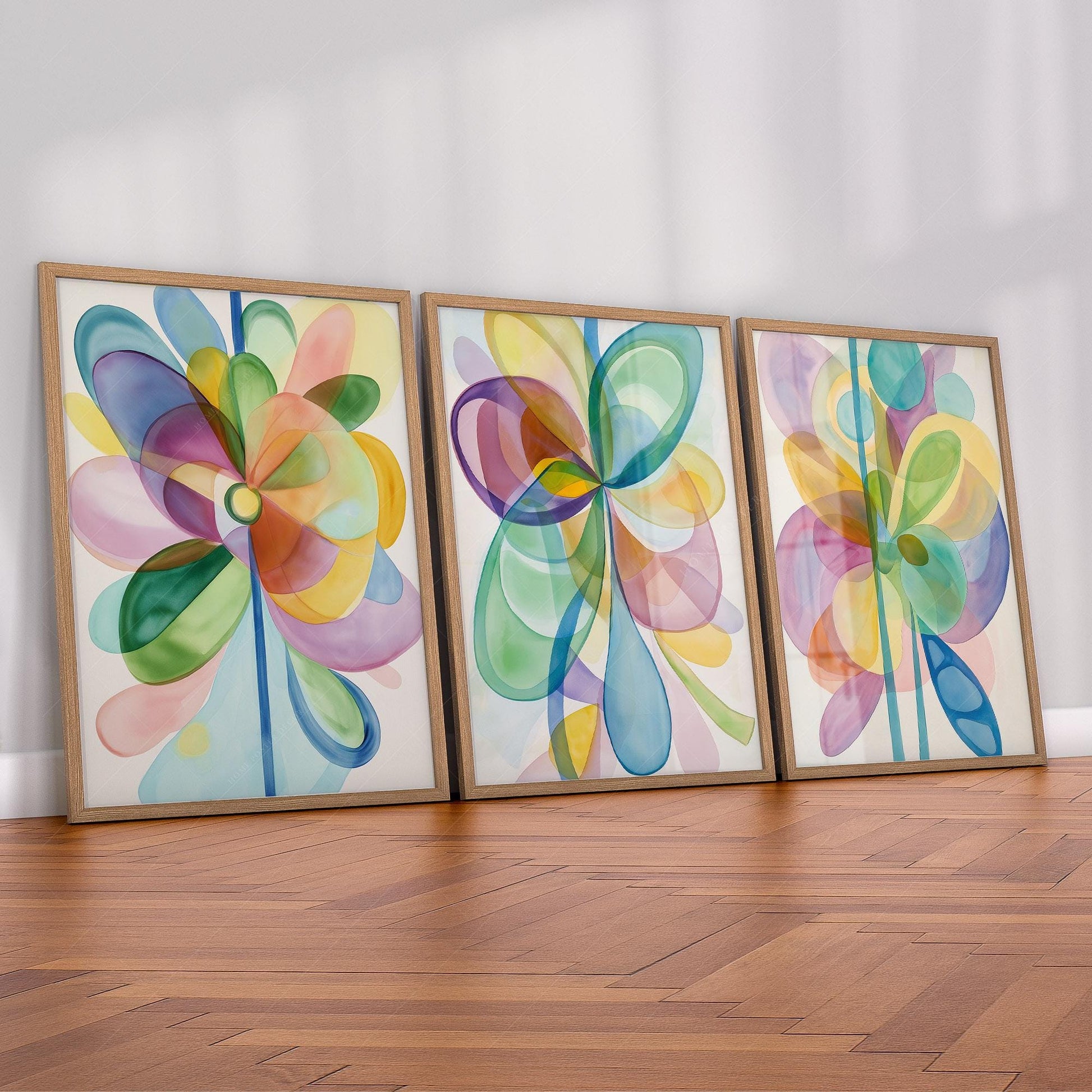 Set of three abstract watercolor flower art prints with colorful overlapping petals as modern wall art.