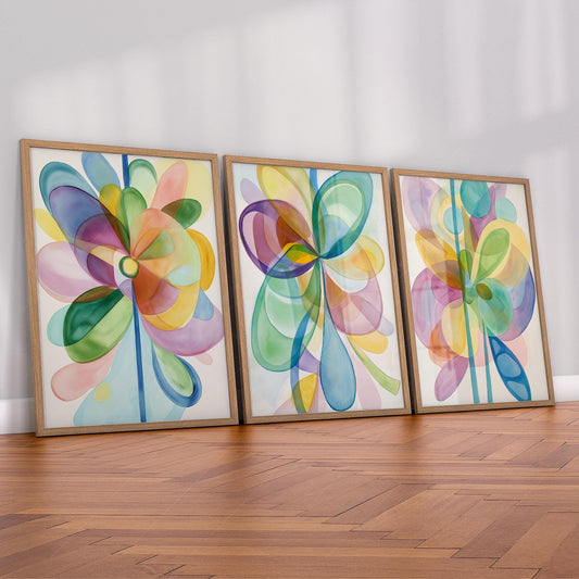 Set of three abstract watercolor flower art prints with colorful overlapping petals as modern wall art.
