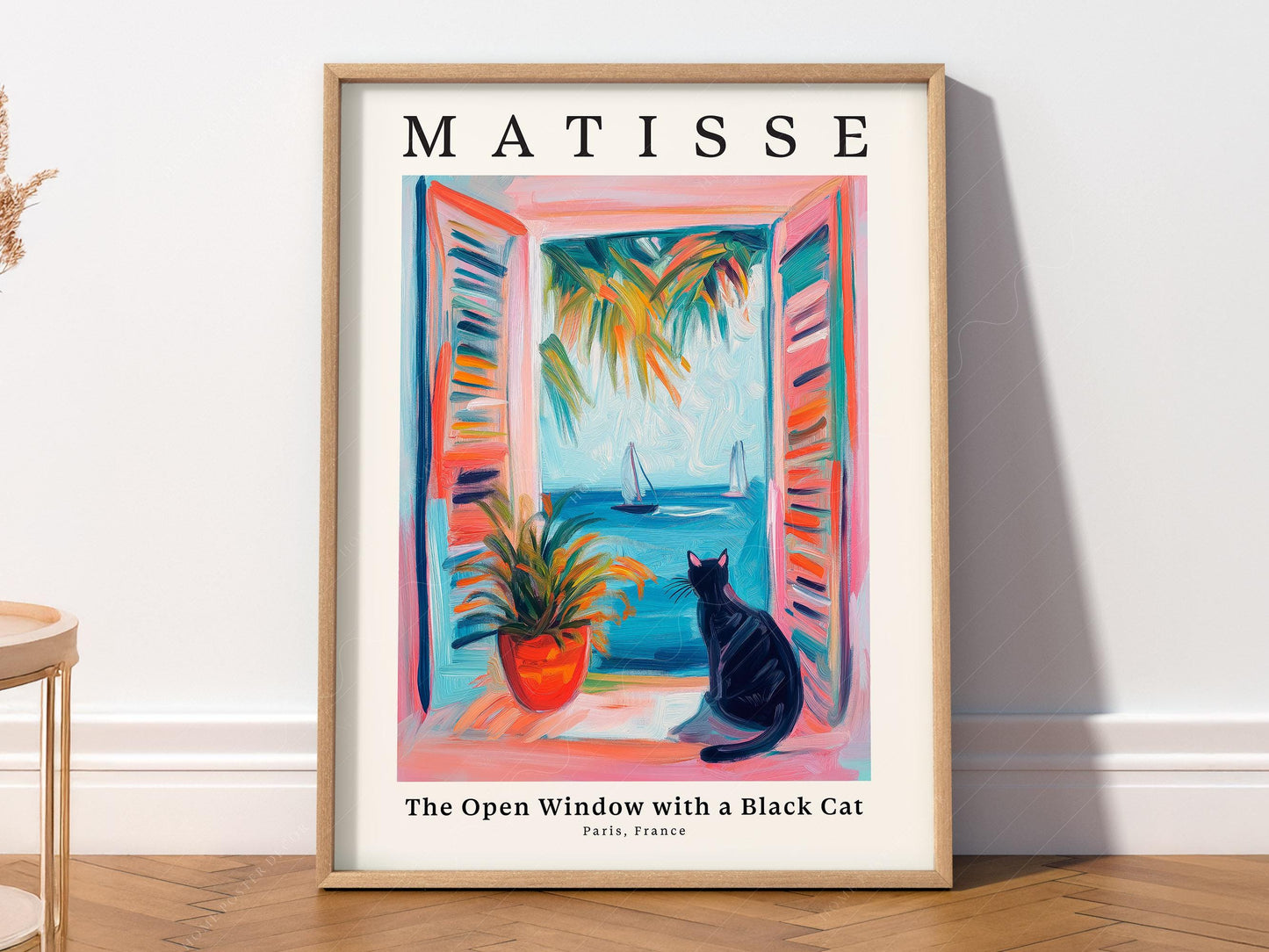 Matisse-inspired art print featuring a black cat sitting at an open window overlooking a Mediterranean seascape with sailboats.