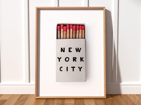 New York City matchbox art print featuring minimalist typography and red-tipped matches as retro wall art.