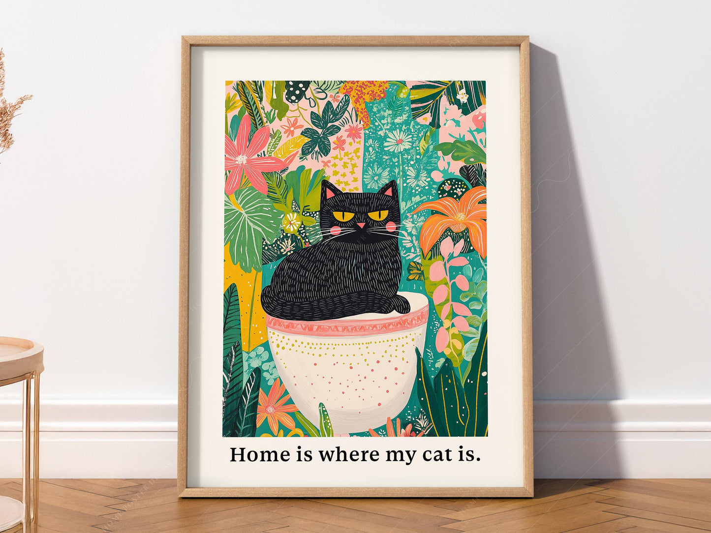 Colorful black cat art print with grumpy cat in bowl surrounded by tropical flowers and botanical patterns wall art.