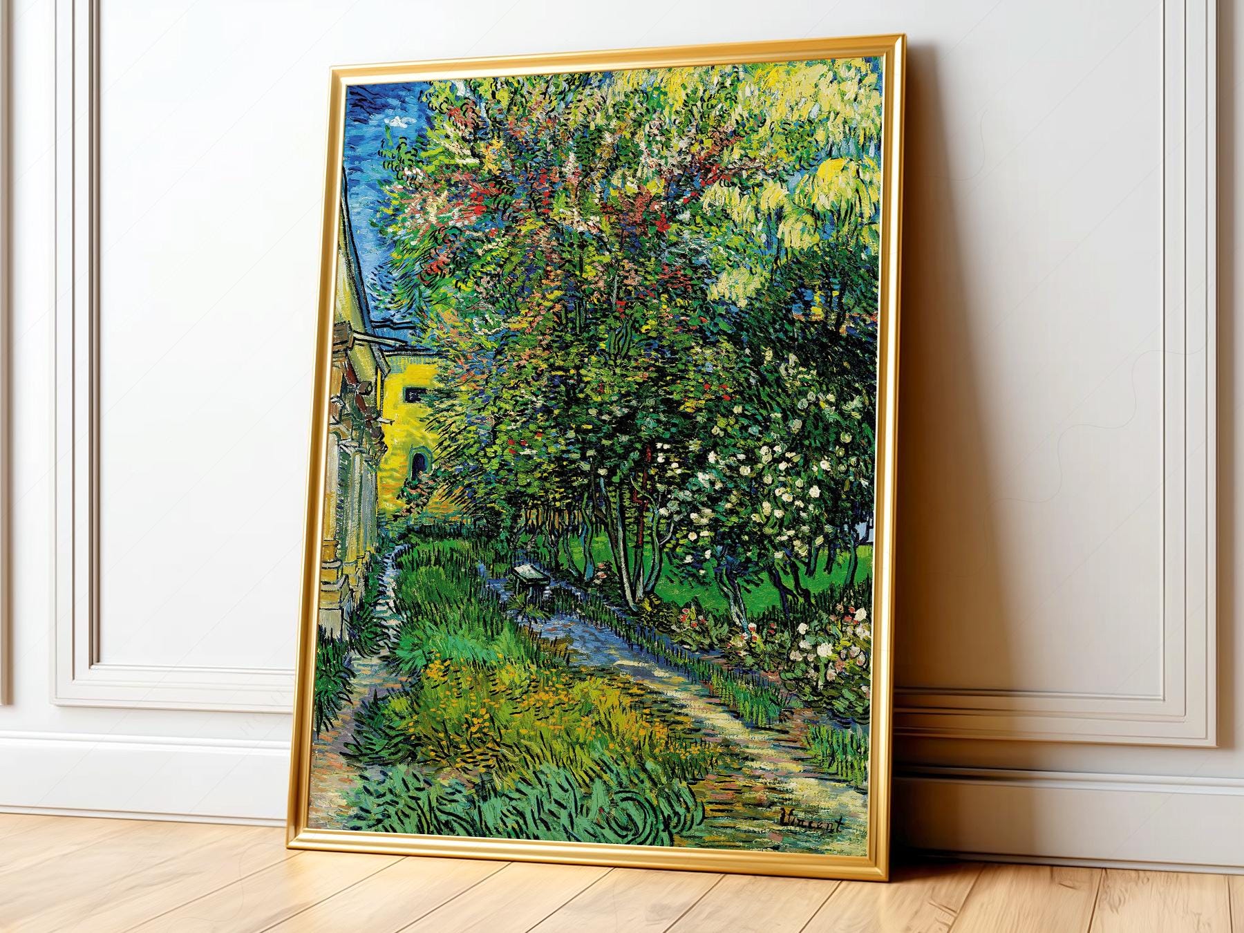 Van Gogh The Garden of the Asylum at Saint-Rémy art print featuring lush green trees and a yellow house.