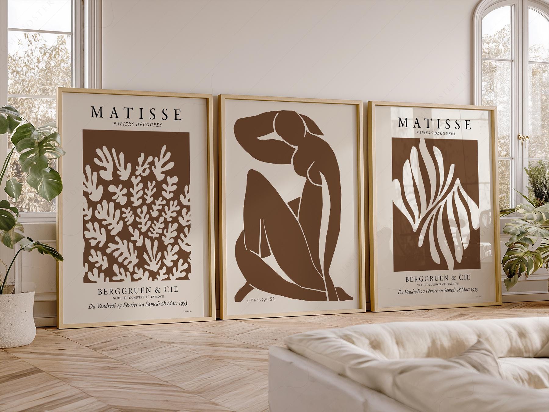 Set of three Henri Matisse cut-out art prints in neutral brown and cream tones displayed as gallery wall art.
