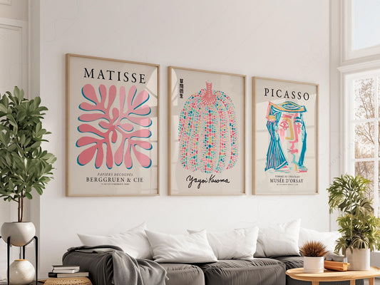 Gallery wall set featuring Matisse paper cut-outs, Yayoi Kusama pumpkin, and Picasso portrait art prints in pastel colors.