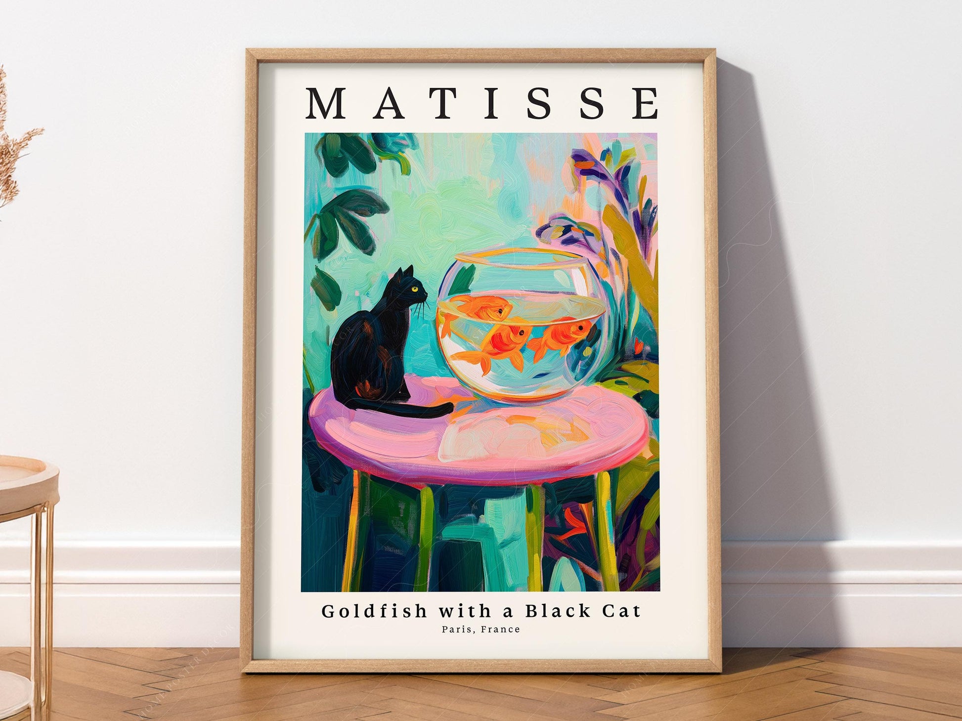 Henri Matisse inspired art print featuring a black cat watching goldfish in a colorful bowl wall art.