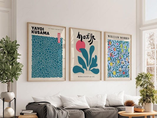 Set of three wall art prints featuring Yayoi Kusama polka dots, Henri Matisse cutout, and William Morris botanical design in teal tones.