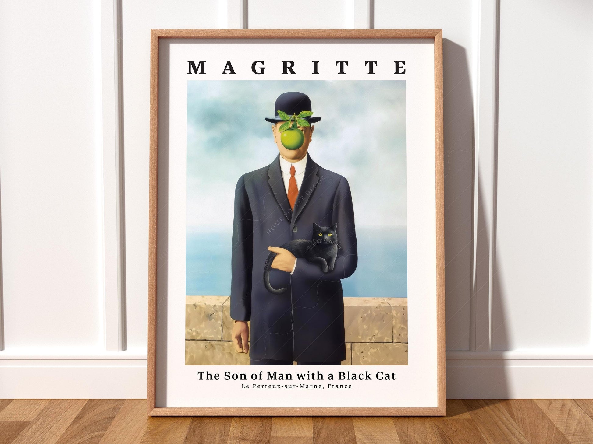 René Magritte Son of Man surrealist art print featuring a bowler-hatted man holding a black cat with green apple wall art.