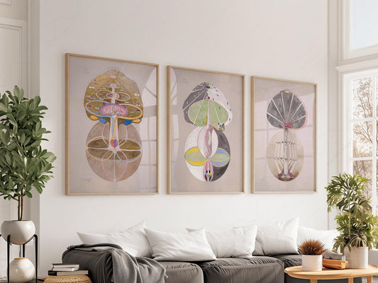 Hilma af Klint The Ten Largest set of three abstract mystical art prints displayed as wall art above a sofa.