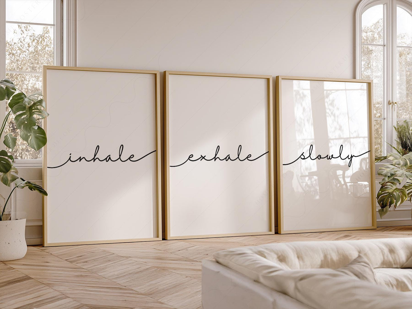 Inhale Exhale Slowly minimalist wall art print set of three with cursive typography on white background.