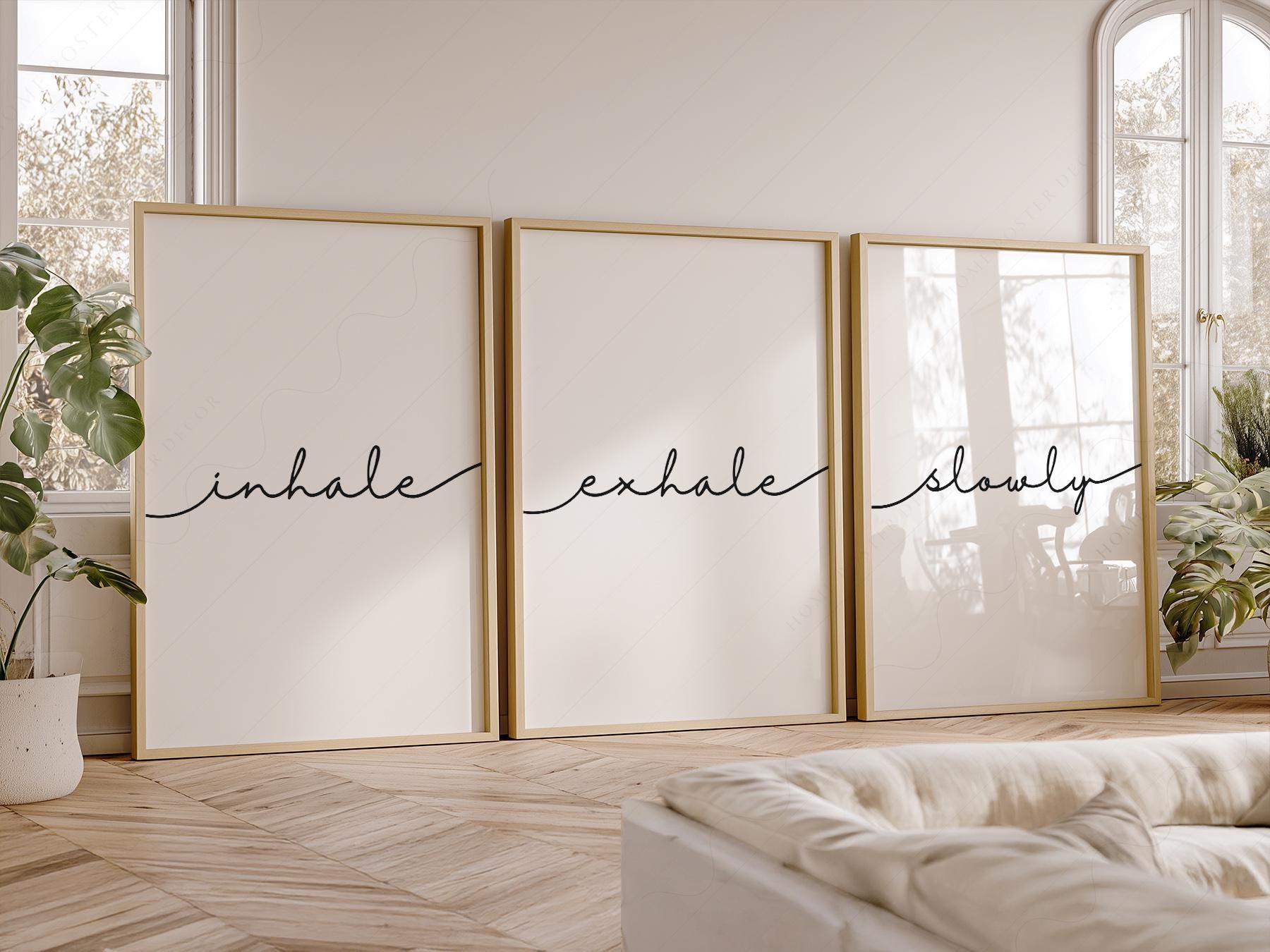 Inhale Exhale Slowly minimalist wall art print set of three with cursive typography on white background.