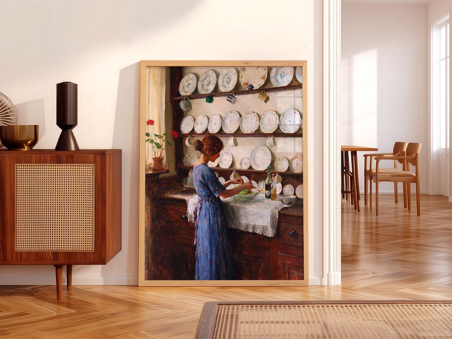 Victorian kitchen scene art print featuring a woman in blue dress preparing salad at a plate-lined dresser wall art.